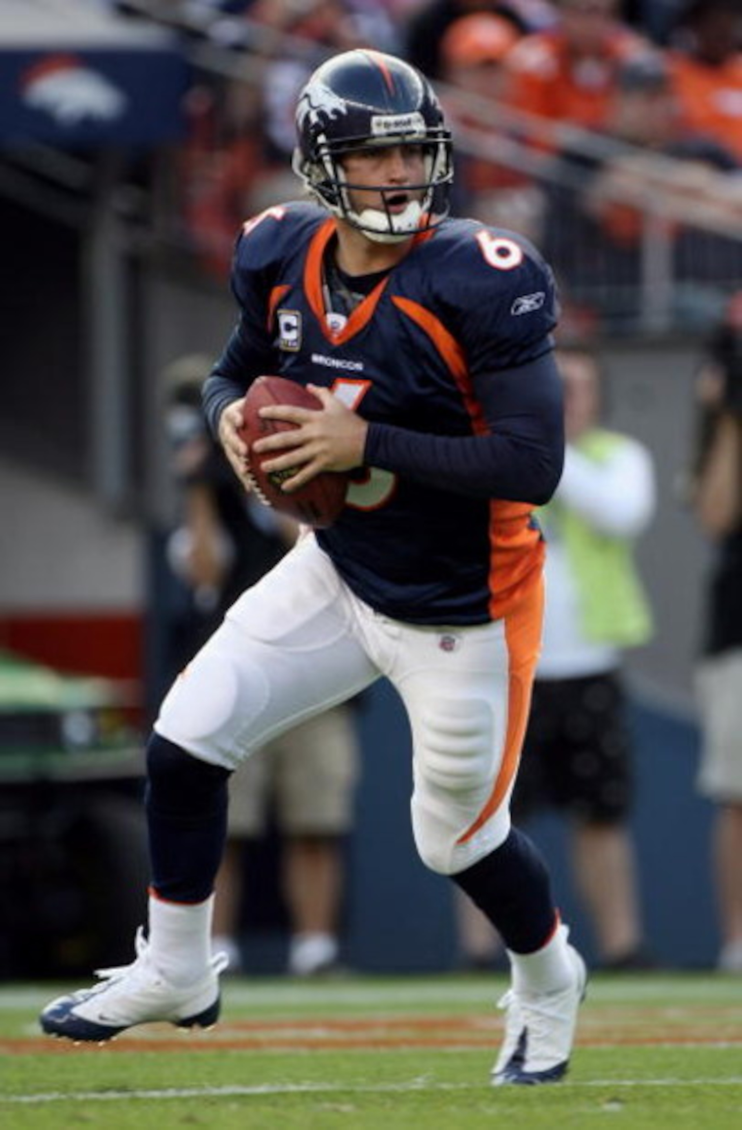 DENVER - NOVEMBER 02: Quarterback Jay Cutler #6 of the Denver Broncos rolls out and looks for a receiver against the Miami Dolphins during NFL action at Invesco Field at Mile High on November 2, 2008 in Denver, Colorado. The Dolphins defeated the Broncos DENVER - NOVEMBER 02: Quarterback Jay Cutler #6 of the Denver Broncos rolls out and looks for a receiver against the Miami Dolphins during NFL action at Invesco Field at Mile High on November 2, 2008 in Denver, Colorado. The Dolphins defeated the Broncos