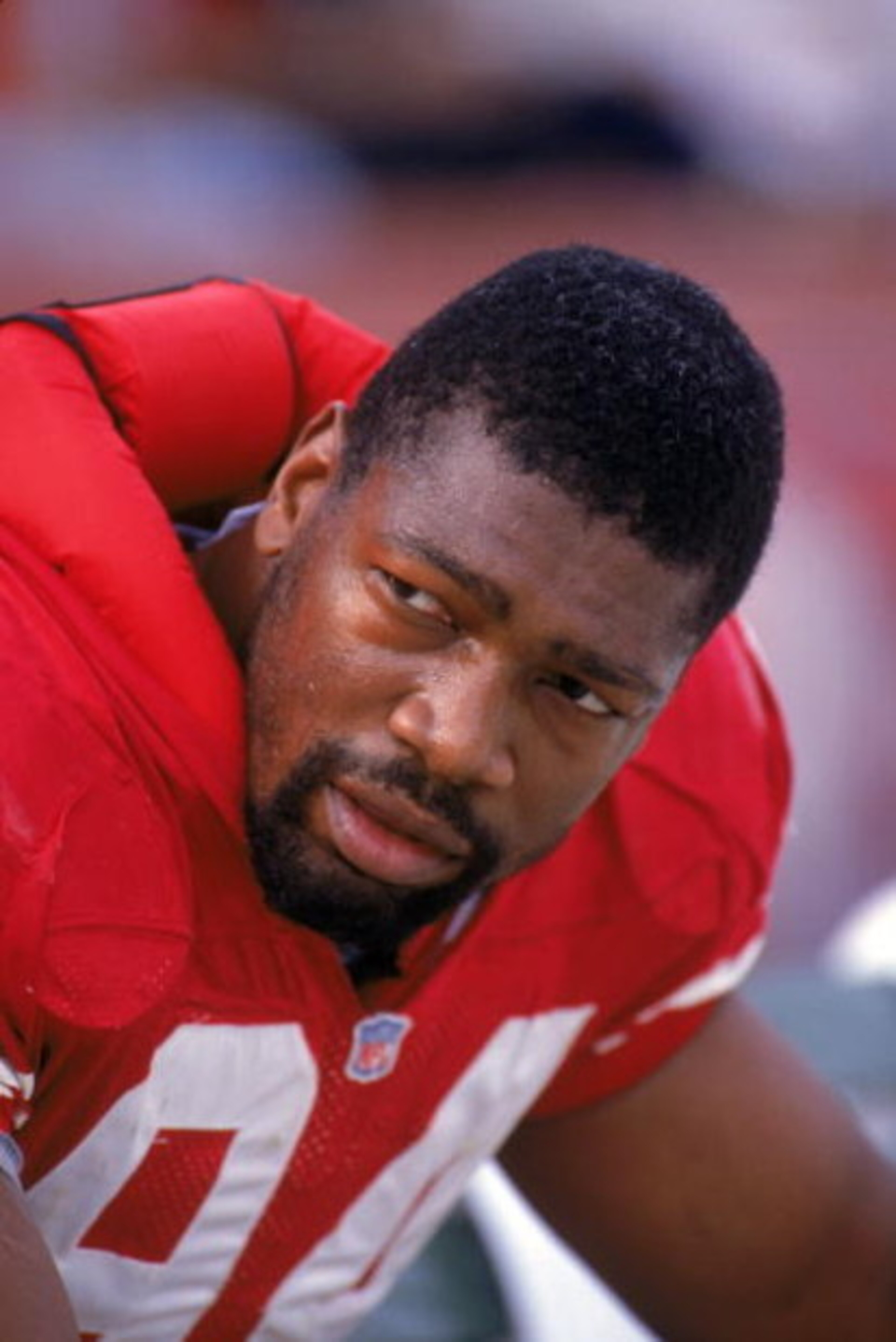 SAN FRANCISCO - DECEMBER 1:  Defensive ends Charles Haley #94 of the San Francisco 49ers takes a rest on the bench during a game against the New Orleans Saints at Candlestick Park on December 1, 1991 in San Francisco, California.  The 49ers won 38-24.  (P
