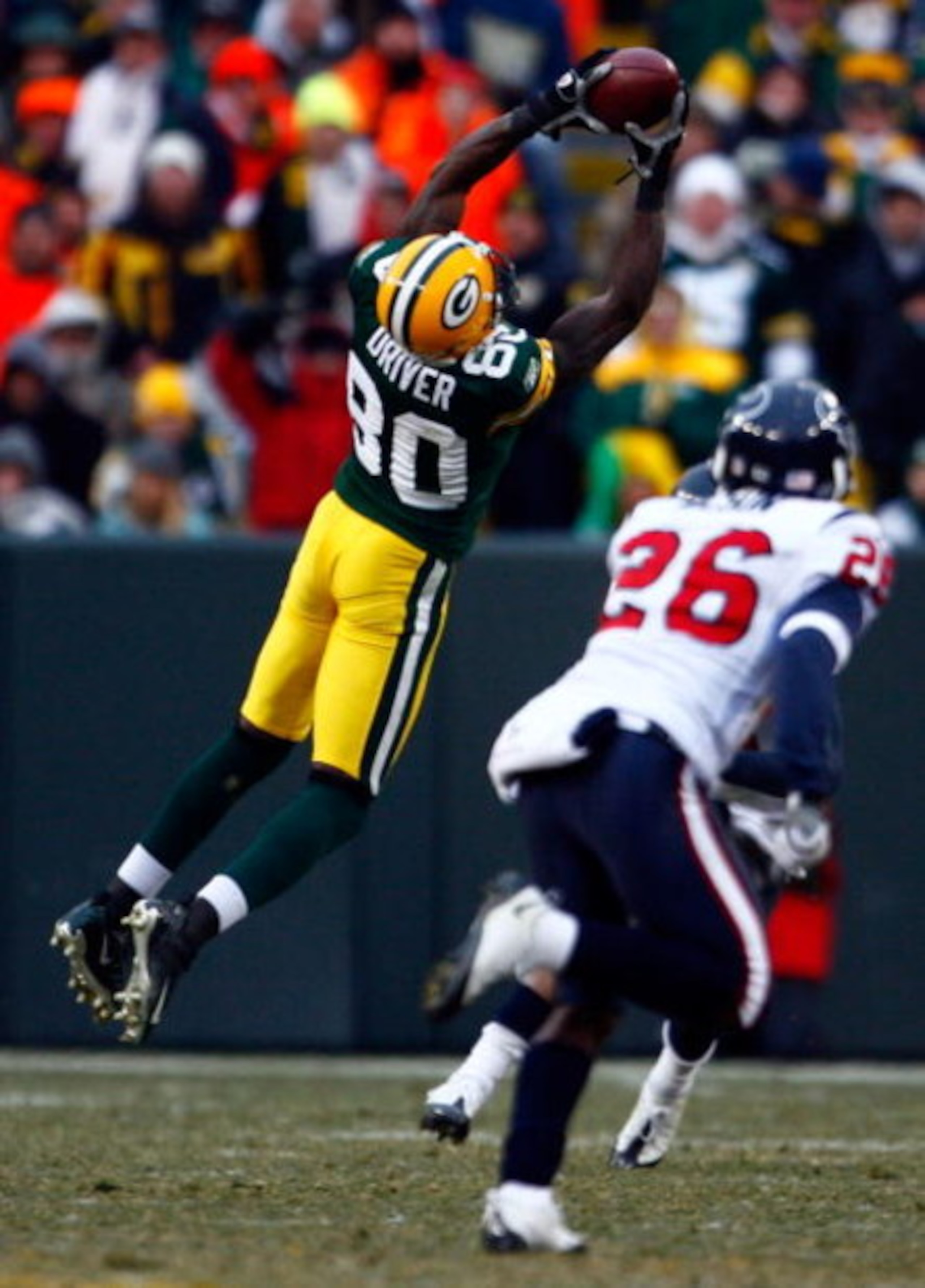 GREEN BAY, WI - DECEMBER 07:  Donald Driver #80 of the Green Bay Packers makes a reception in the second half against the Houston Texans at Lambeau Field on December 7, 2008 in Green Bay, Wisconsin. The Texans defeated the Packers 24-21.  (Photo by Jeff G