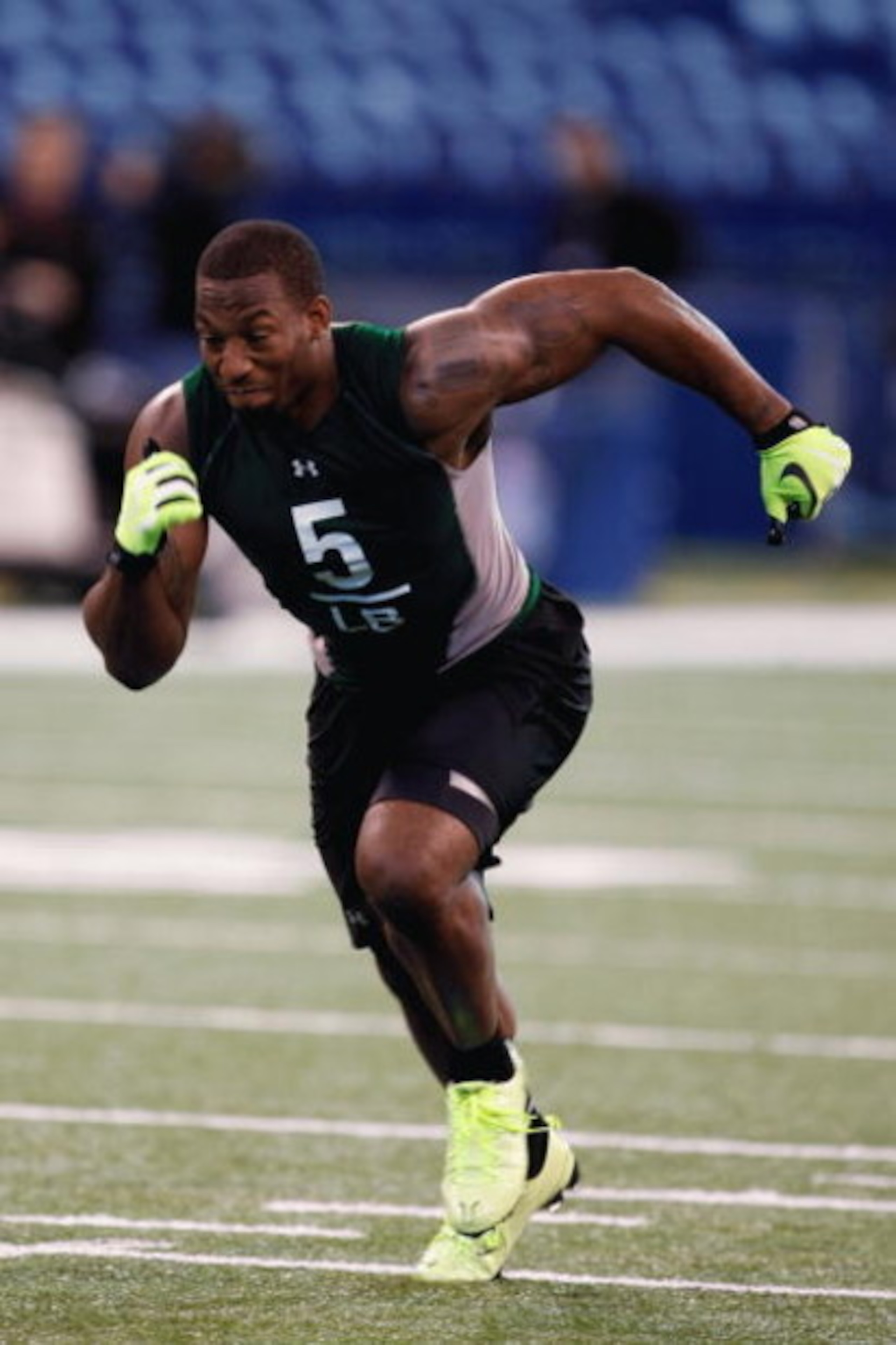 INDIANAPOLIS, IN - FEBRUARY 23:  Linebacker Aaron Curry of Wake Forest runs during the NFL Scouting Combine presented by Under Armour at Lucas Oil Stadium on February 23, 2009 in Indianapolis, Indiana. (Photo by Scott Boehm/Getty Images)