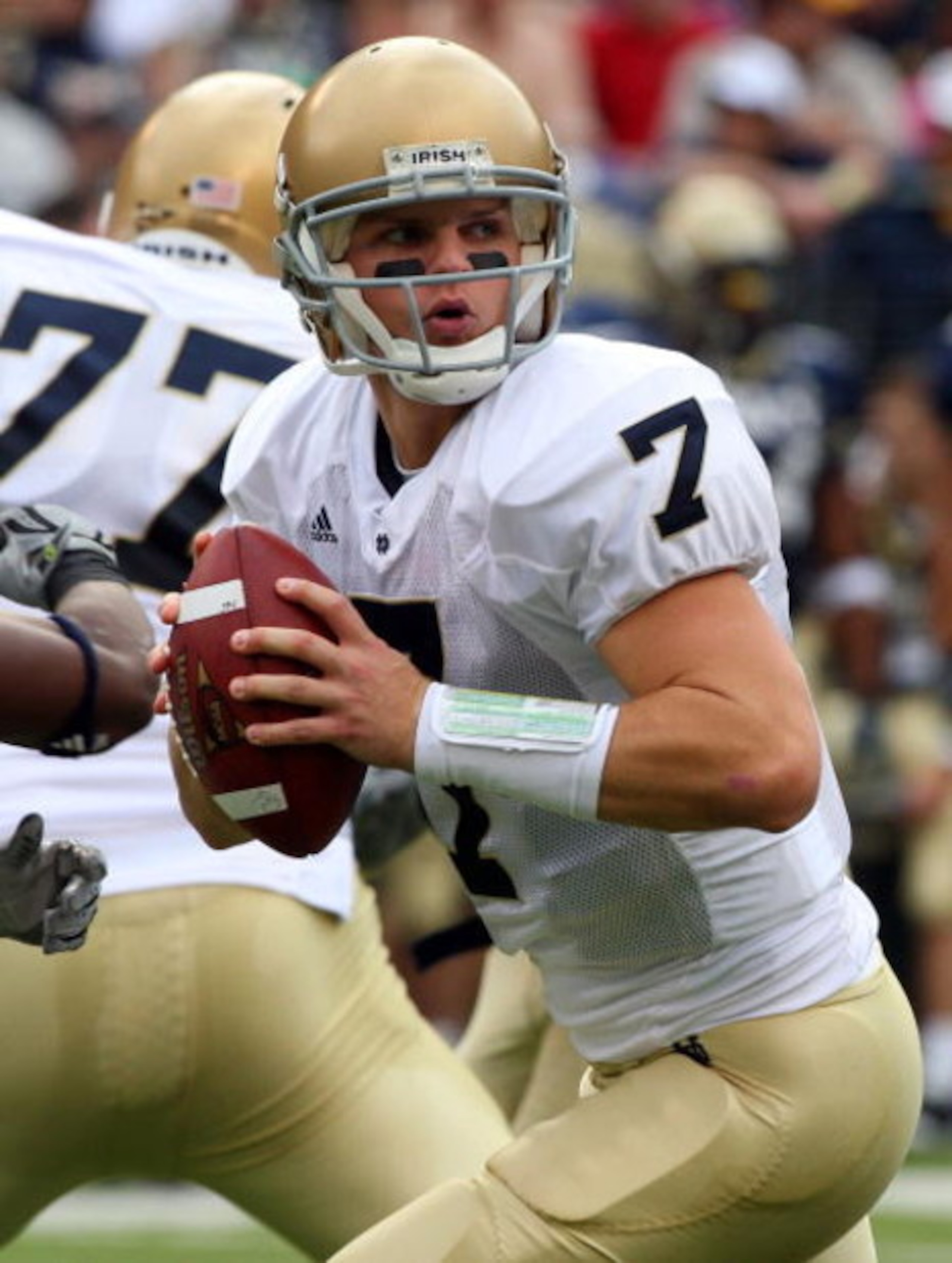 BALTIMORE - NOVEMBER 15:  Jimmy Clausen #7 of the Notre Dame Fighting Irish drops back to throw a pass against the Navy Midshipmen on November 15, 2008 at M&T Bank Stadium in Baltimore, Maryland. Notre Dame defeated Navy 27-21.  (Photo by Jim McIsaac/Gett