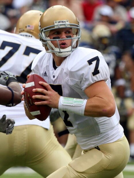 BALTIMORE - NOVEMBER 15:  Jimmy Clausen #7 of the Notre Dame Fighting Irish drops back to throw a pass against the Navy Midshipmen on November 15, 2008 at M&T Bank Stadium in Baltimore, Maryland. Notre Dame defeated Navy 27-21.  (Photo by Jim McIsaac/Gett