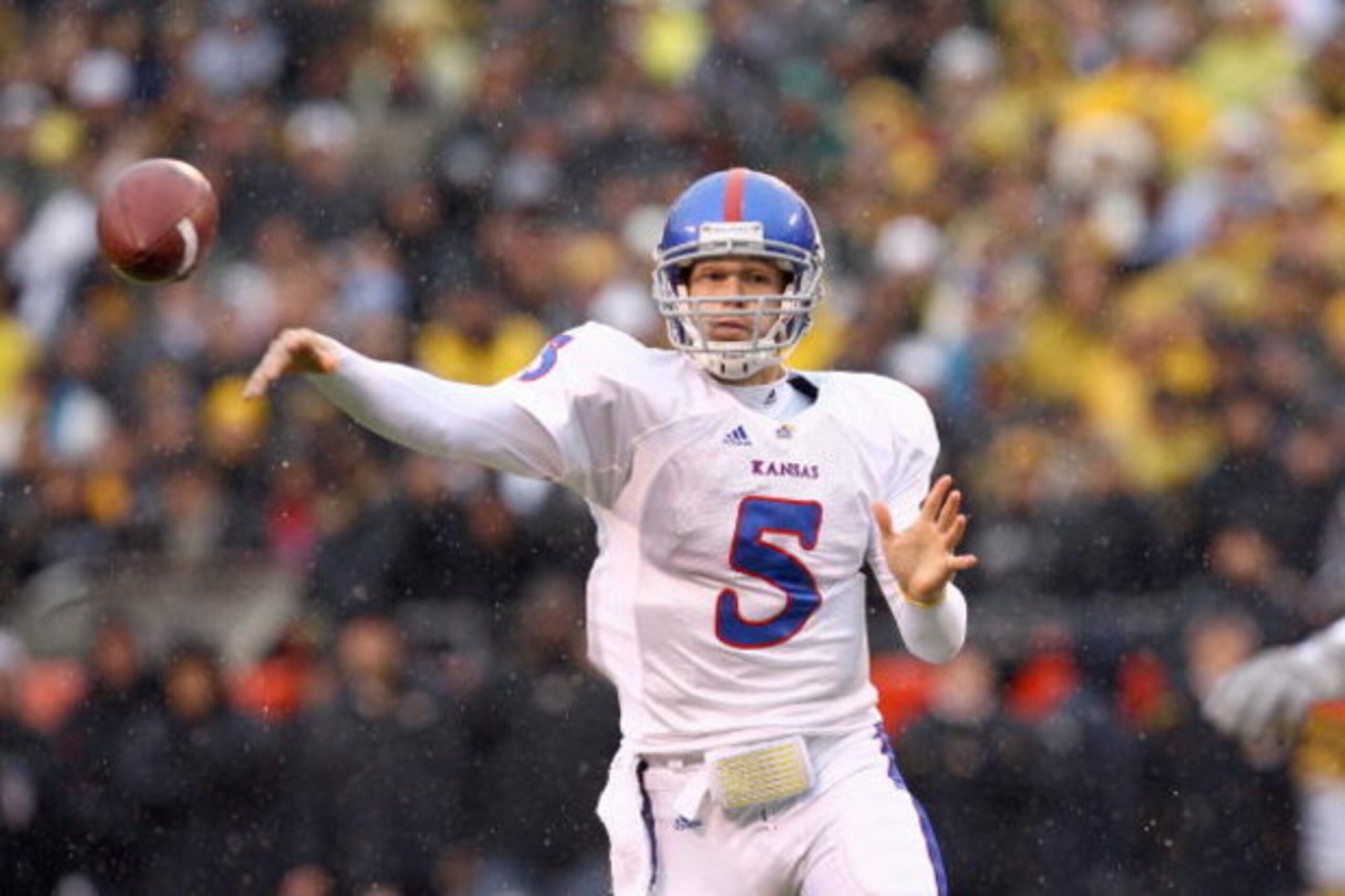 KANSAS CITY, MO - NOVEMBER 29: Todd Reesing #5 of the Kansas Jayhawks passes the ball during the game against the Missouri Tigers on November 29, 2008 at Arrowhead Stadium in Kansas City, Missouri. (Photo by Jamie Squire/Getty Images)