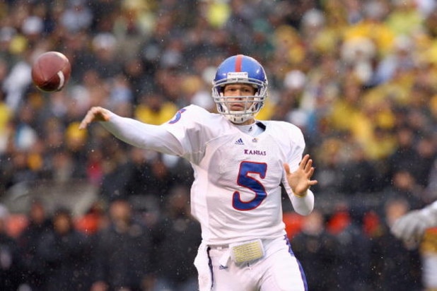 KANSAS CITY, MO - NOVEMBER 29: Todd Reesing #5 of the Kansas Jayhawks passes the ball during the game against the Missouri Tigers on November 29, 2008 at Arrowhead Stadium in Kansas City, Missouri. (Photo by Jamie Squire/Getty Images)