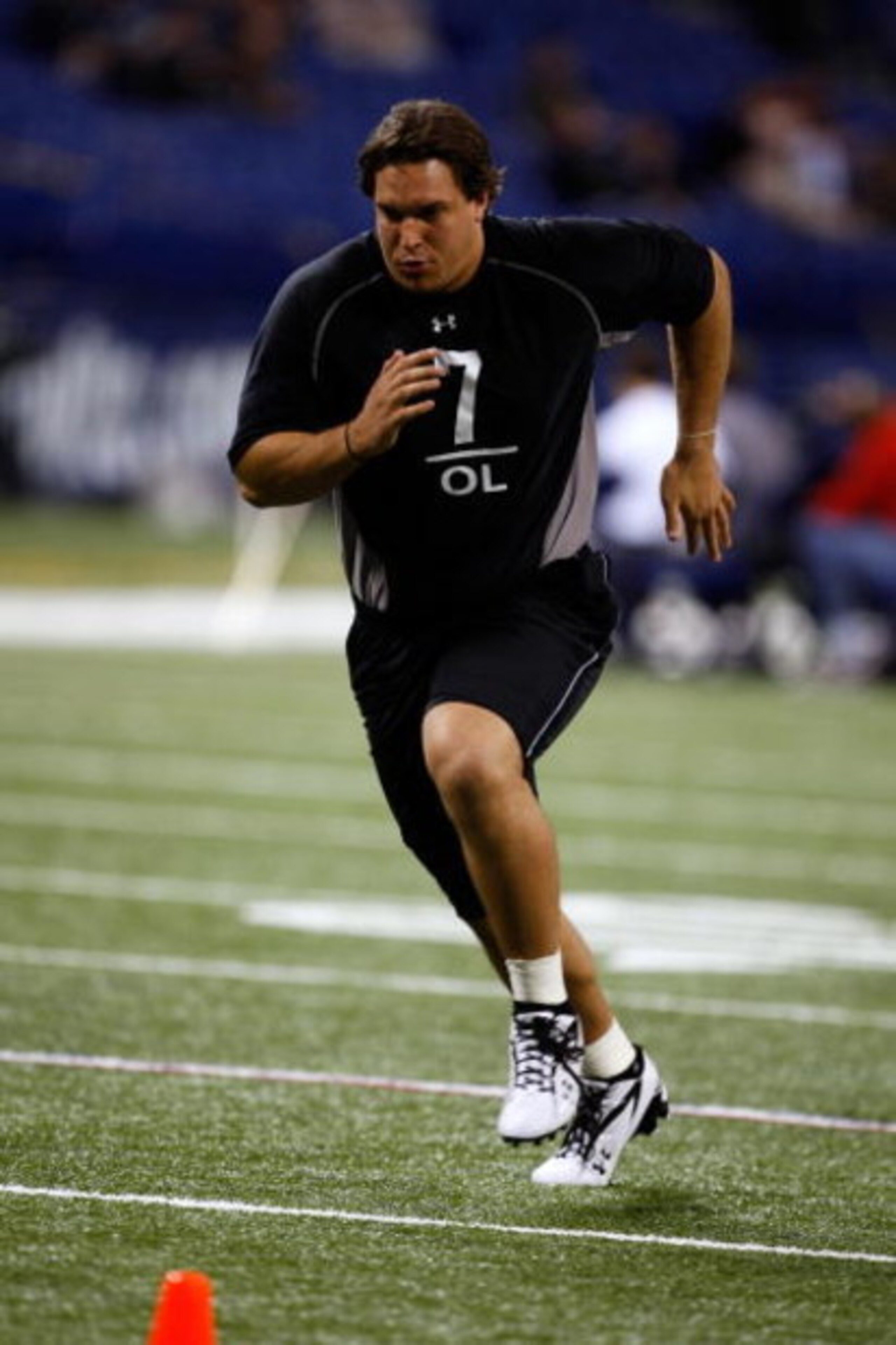 INDIANAPOLIS, IN - FEBRUARY 21: Offensive lineman Eben Britton of Arizona runs as he participates in practice drills during the NFL Scouting Combine presented by Under Armour at Lucas Oil Stadium on February 21, 2009 in Indianapolis, Indiana. (Photo by S INDIANAPOLIS, IN - FEBRUARY 21: Offensive lineman Eben Britton of Arizona runs as he participates in practice drills during the NFL Scouting Combine presented by Under Armour at Lucas Oil Stadium on February 21, 2009 in Indianapolis, Indiana. (Photo by S