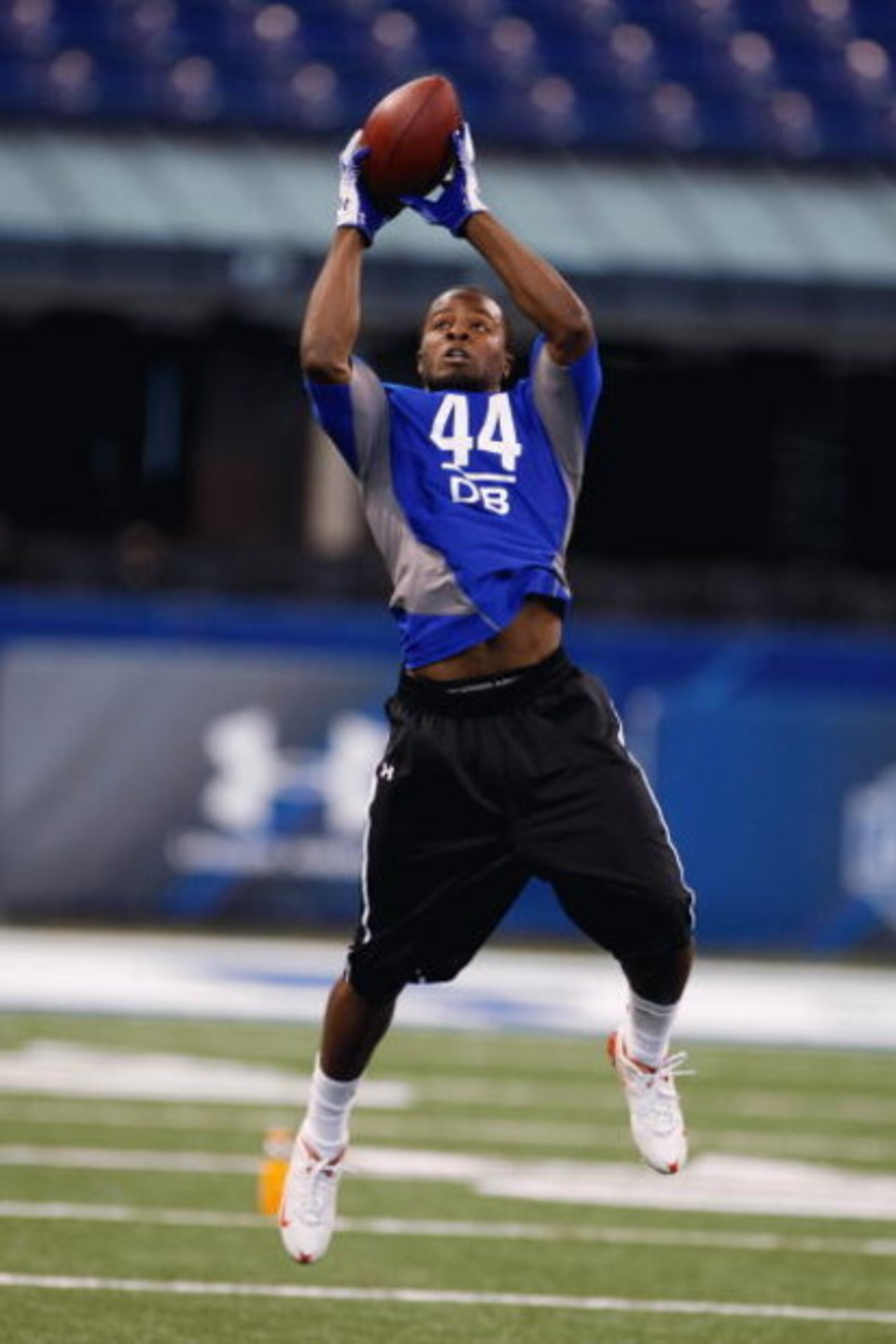 INDIANAPOLIS, IN - FEBRUARY 24: Defensive back Alphonso Smith of Wake Forest jumps in the air to catch the football in practice drills during the NFL Scouting Combine presented by Under Armour at Lucas Oil Stadium on February 24, 2009 in Indianapolis, In INDIANAPOLIS, IN - FEBRUARY 24: Defensive back Alphonso Smith of Wake Forest jumps in the air to catch the football in practice drills during the NFL Scouting Combine presented by Under Armour at Lucas Oil Stadium on February 24, 2009 in Indianapolis, In