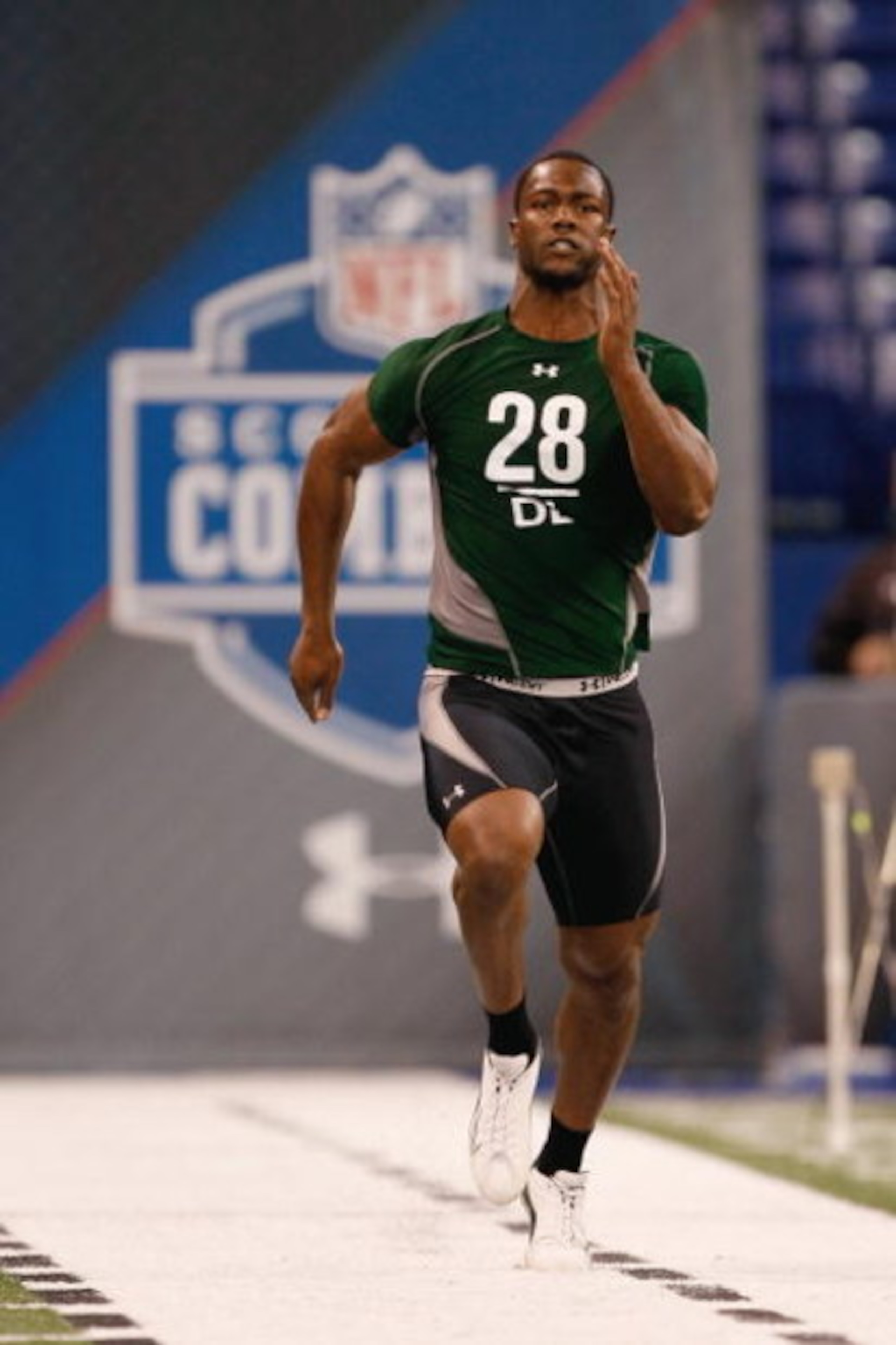 INDIANAPOLIS, IN - FEBRUARY 23: Defensive lineman Mike Johnson of Georgia Tech runs the 40 yard dash during the NFL Scouting Combine presented by Under Armour at Lucas Oil Stadium on February 23, 2009 in Indianapolis, Indiana. (Photo by Scott Boehm/Getty INDIANAPOLIS, IN - FEBRUARY 23: Defensive lineman Mike Johnson of Georgia Tech runs the 40 yard dash during the NFL Scouting Combine presented by Under Armour at Lucas Oil Stadium on February 23, 2009 in Indianapolis, Indiana. (Photo by Scott Boehm/Getty
