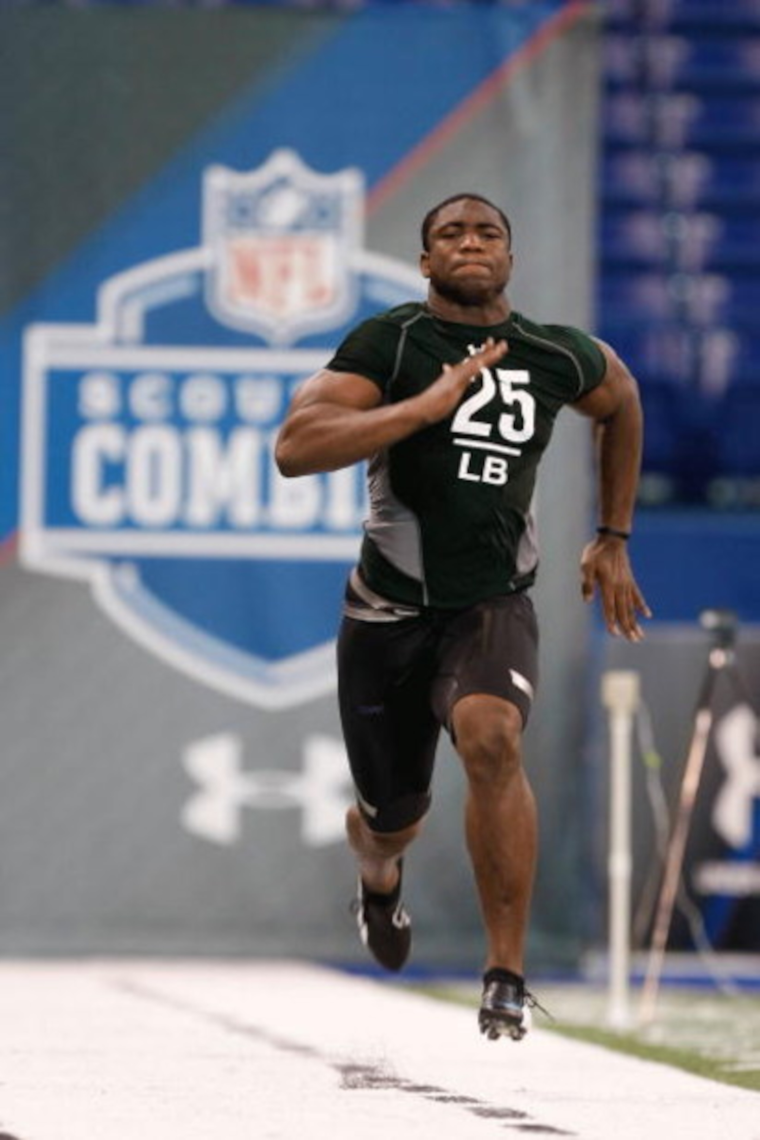 INDIANAPOLIS, IN - FEBRUARY 23: Linebacker Clint Sintim of Virginia runs the 40 yard dash during the NFL Scouting Combine presented by Under Armour at Lucas Oil Stadium on February 23, 2009 in Indianapolis, Indiana. (Photo by Scott Boehm/Getty Images) INDIANAPOLIS, IN - FEBRUARY 23: Linebacker Clint Sintim of Virginia runs the 40 yard dash during the NFL Scouting Combine presented by Under Armour at Lucas Oil Stadium on February 23, 2009 in Indianapolis, Indiana. (Photo by Scott Boehm/Getty Images)