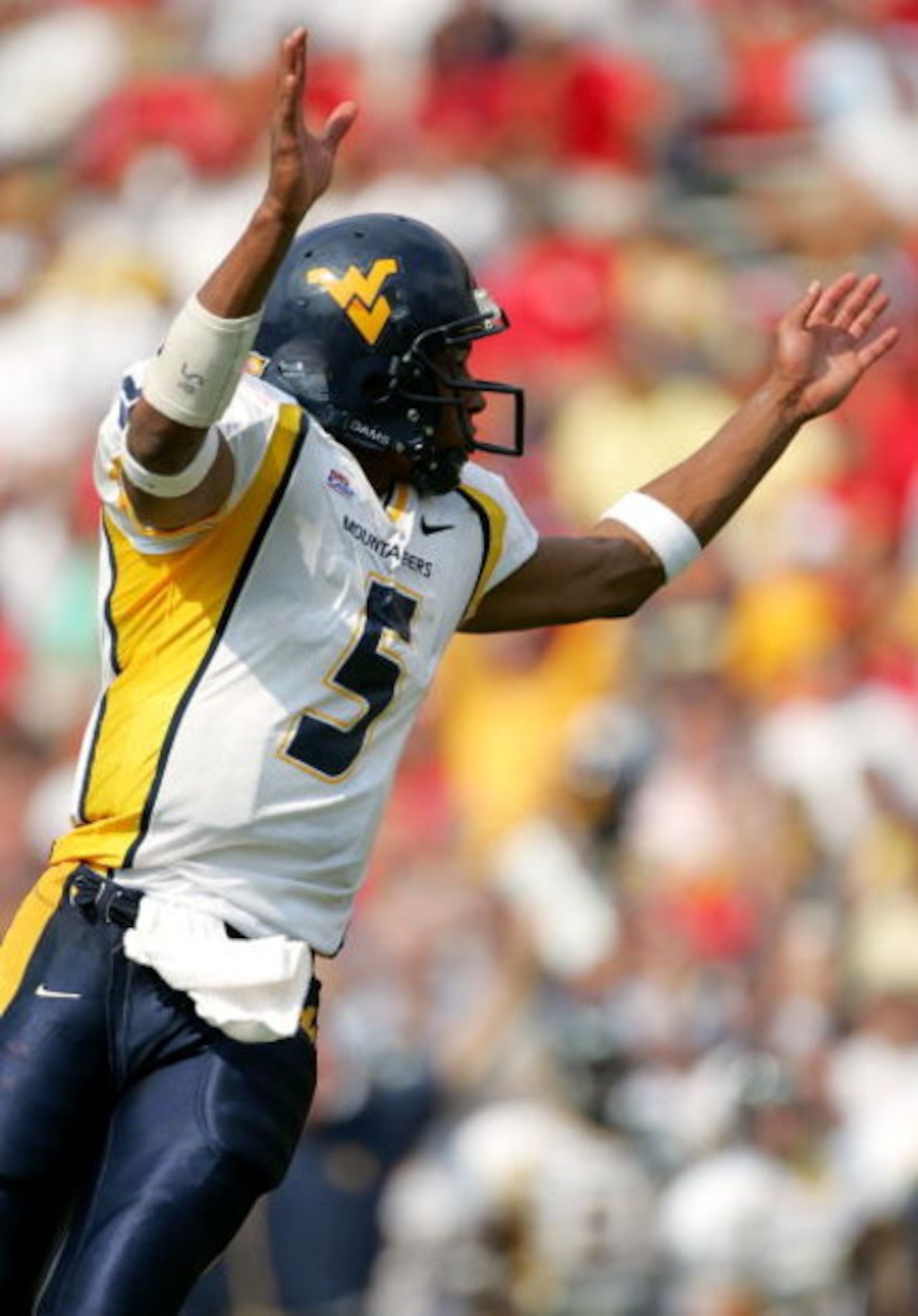 COLLEGE PARK, MD - SEPTEMBER 17: Quarterback Pat White #5 of West Virginia celebrates after a touchdown during the second half of the game against Maryland on September 17, 2005 at Byrd Stadium in College Park, Maryland. (Photo by Jamie Squire/Getty Ima COLLEGE PARK, MD - SEPTEMBER 17: Quarterback Pat White #5 of West Virginia celebrates after a touchdown during the second half of the game against Maryland on September 17, 2005 at Byrd Stadium in College Park, Maryland. (Photo by Jamie Squire/Getty Ima