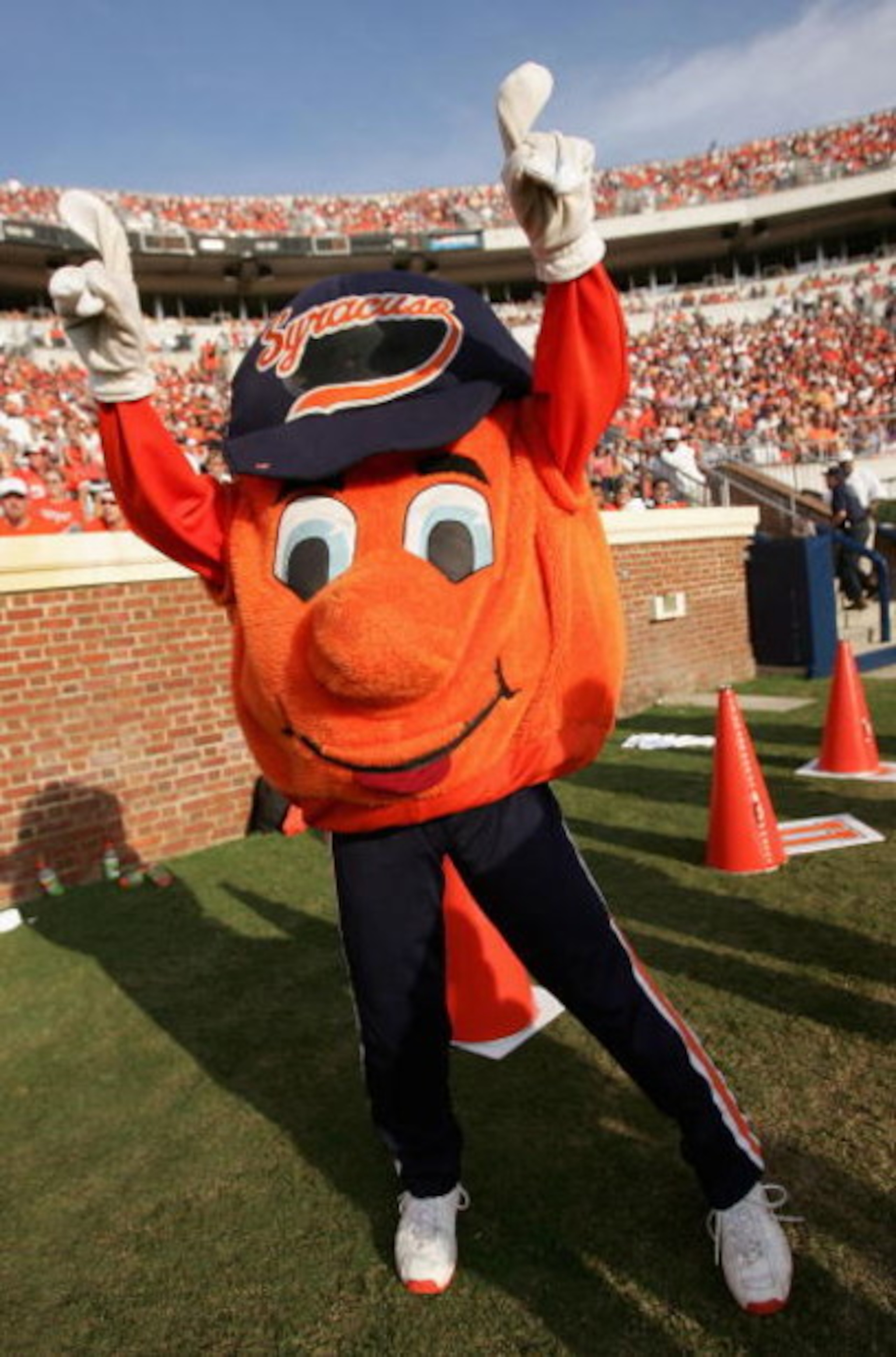CHARLOTTESVILLE, VA - SEPTEMBER 25: The Syracue Orangeman mascot supports his team as they were defeated by the Virginia Cavaliers 31-10 at Scott Stadium on September 25, 2004 in Charlottesville, Virginia. (Photo by Doug Pensinger/Getty Images) CHARLOTTESVILLE, VA - SEPTEMBER 25: The Syracue Orangeman mascot supports his team as they were defeated by the Virginia Cavaliers 31-10 at Scott Stadium on September 25, 2004 in Charlottesville, Virginia. (Photo by Doug Pensinger/Getty Images)