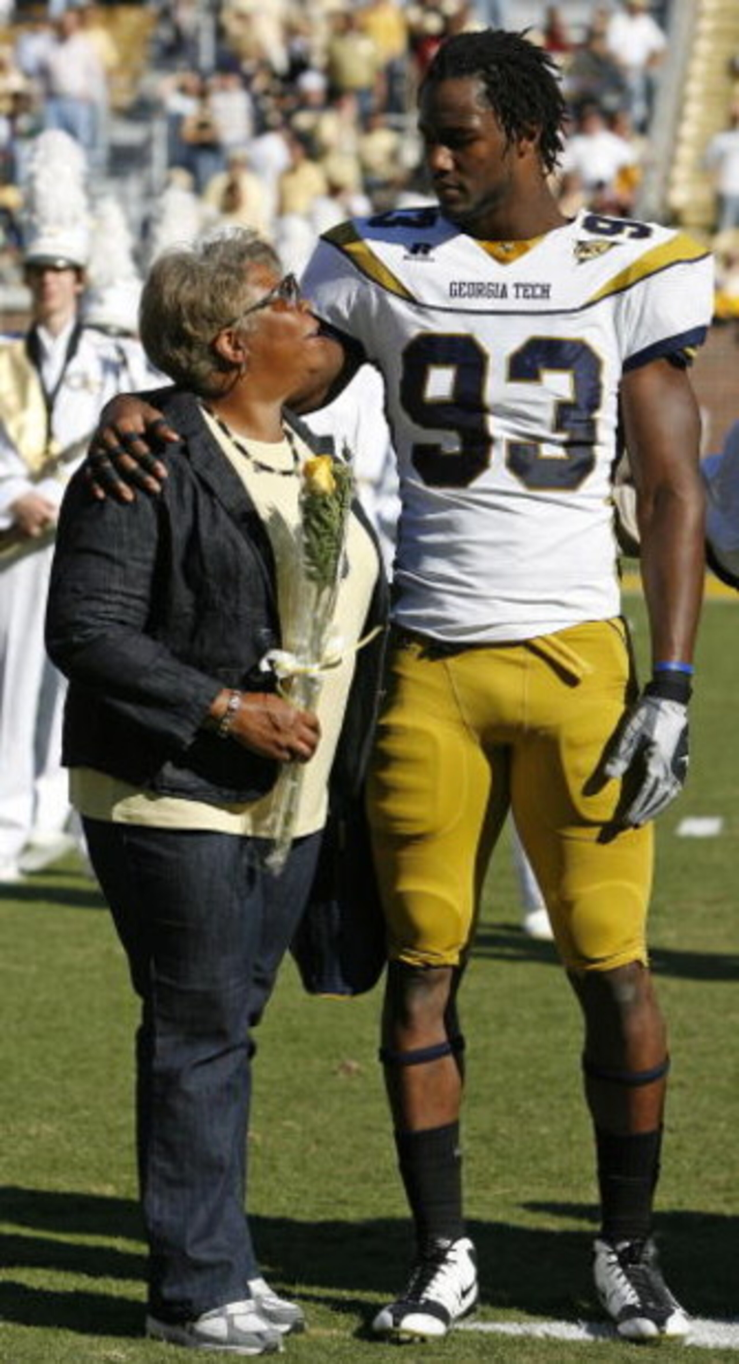 ATLANTA - NOVEMBER 1: Defensive end Michael Johnson #93 of the Georgia Tech Yellow Jackets talks with his mother Thomasene during Senior Day festivities before the game between the Florida State Seminoles and the Georgia Tech Yellow Jackets at Bobby Dodd ATLANTA - NOVEMBER 1: Defensive end Michael Johnson #93 of the Georgia Tech Yellow Jackets talks with his mother Thomasene during Senior Day festivities before the game between the Florida State Seminoles and the Georgia Tech Yellow Jackets at Bobby Dodd
