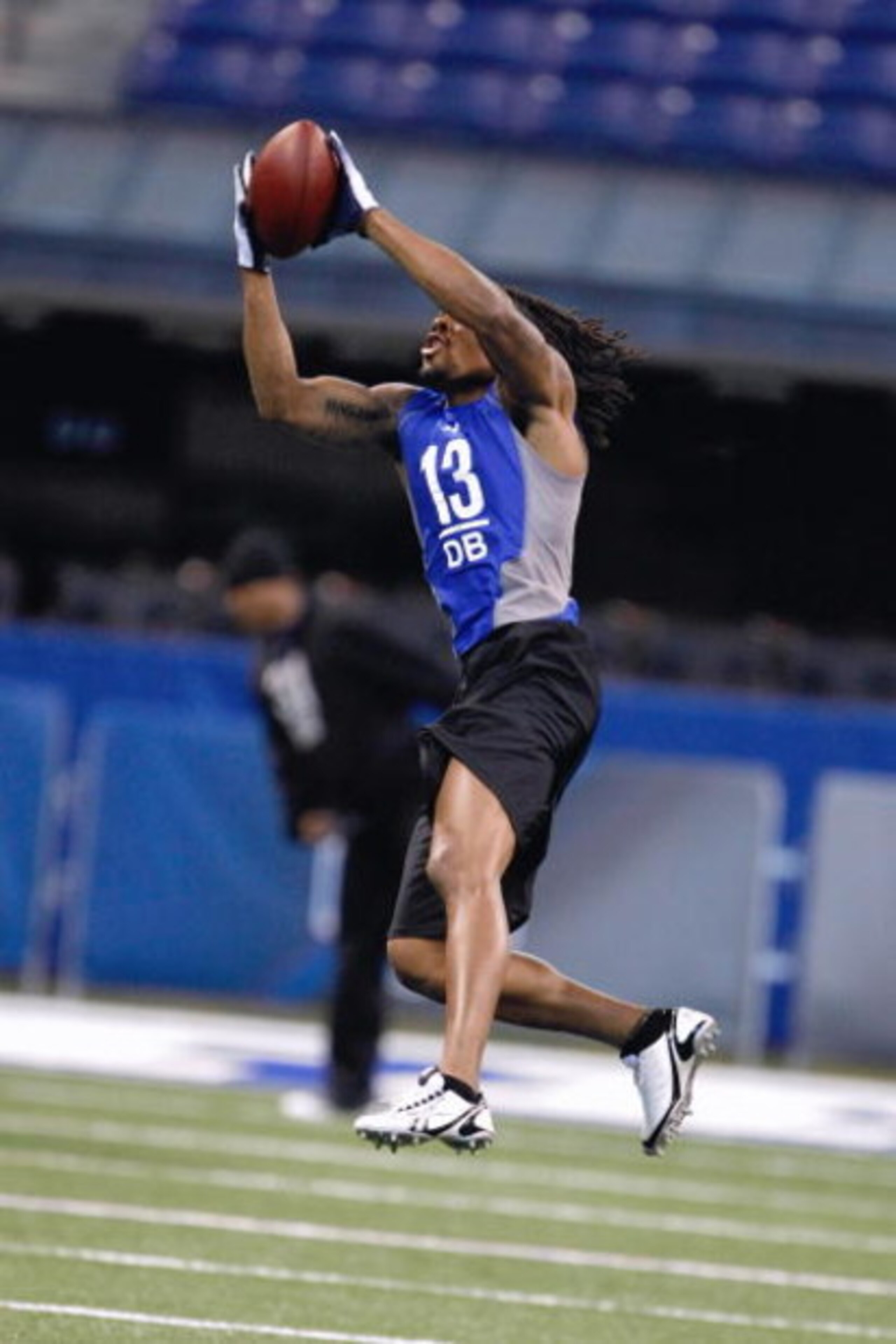 INDIANAPOLIS, IN - FEBRUARY 24: Defensive back Louis Delmas of Western Michigan catches the football in practice drills during the NFL Scouting Combine presented by Under Armour at Lucas Oil Stadium on February 24, 2009 in Indianapolis, Indiana. (Photo b INDIANAPOLIS, IN - FEBRUARY 24: Defensive back Louis Delmas of Western Michigan catches the football in practice drills during the NFL Scouting Combine presented by Under Armour at Lucas Oil Stadium on February 24, 2009 in Indianapolis, Indiana. (Photo b