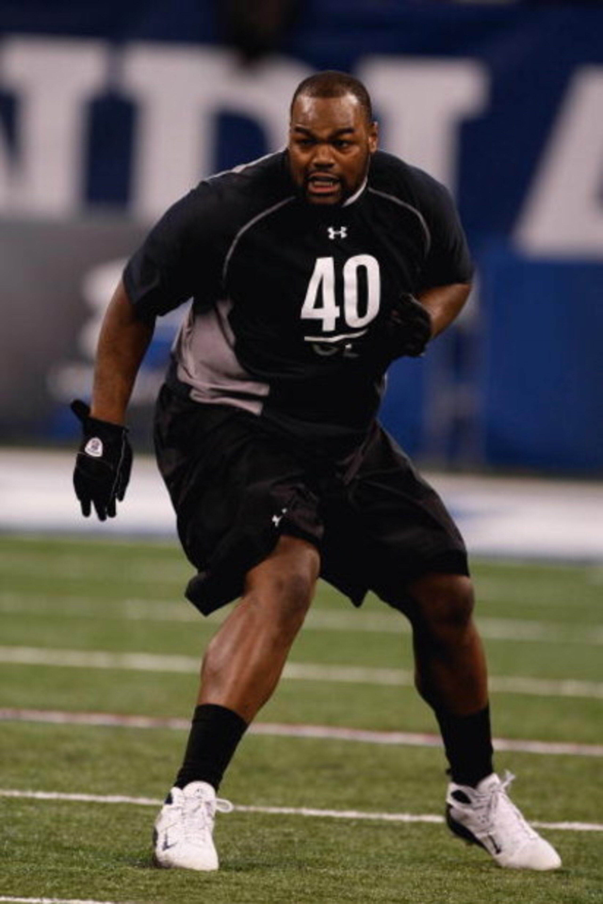 INDIANAPOLIS, IN - FEBRUARY 21: Offensive lineman Michael Oher of Mississippi runs in practice drills during the NFL Scouting Combine presented by Under Armour at Lucas Oil Stadium on February 21, 2009 in Indianapolis, Indiana. (Photo by Scott Boehm/Gett INDIANAPOLIS, IN - FEBRUARY 21: Offensive lineman Michael Oher of Mississippi runs in practice drills during the NFL Scouting Combine presented by Under Armour at Lucas Oil Stadium on February 21, 2009 in Indianapolis, Indiana. (Photo by Scott Boehm/Gett