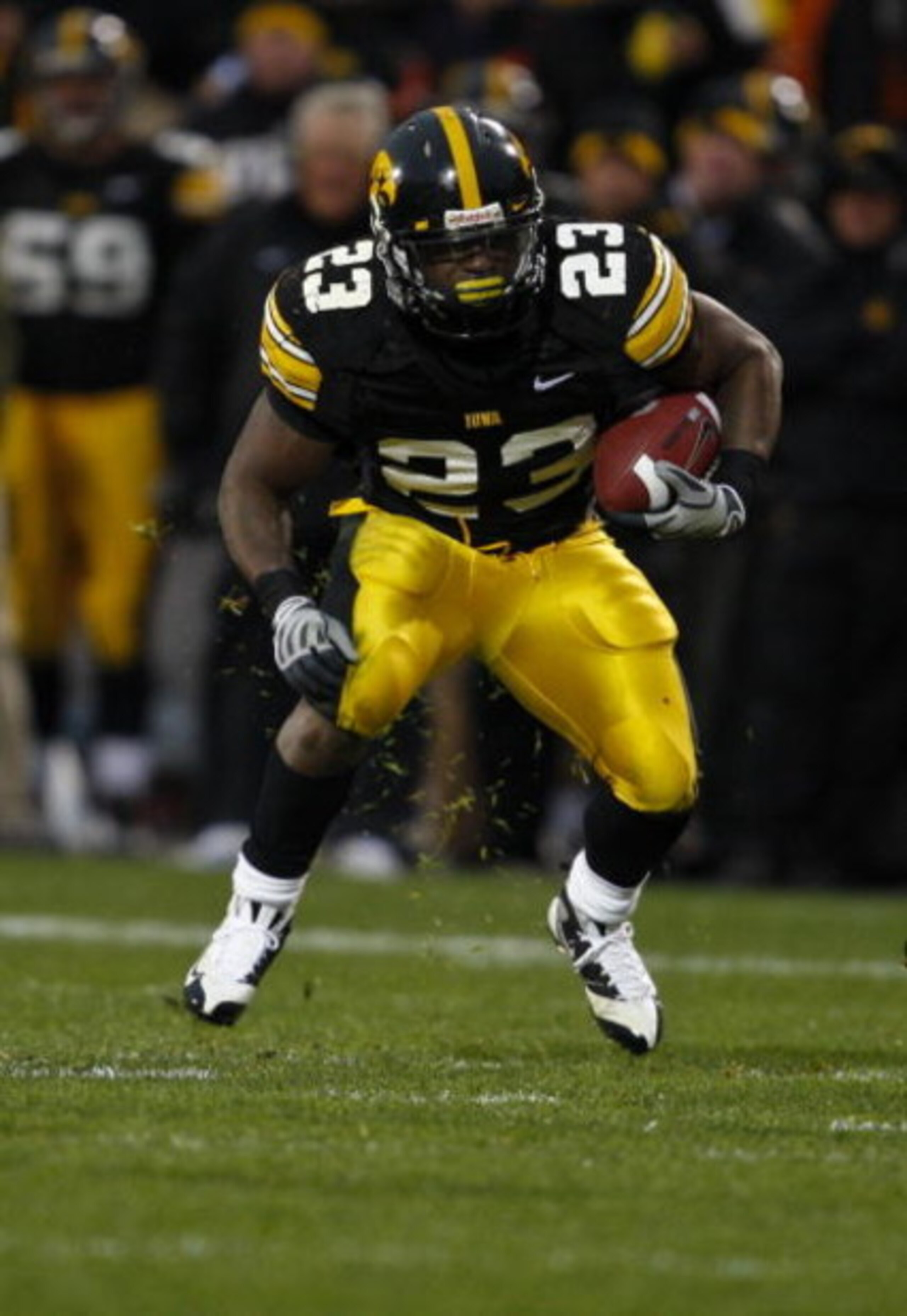IOWA CITY, IOWA - NOVEMBER 8: Shonn Greene #23 of the Iowa Hawkeyes rushes for yards in the third quarter of play against the Penn State Nittany Lions at Kinnick Stadium on November 8, 2008 in Iowa City, Iowa. Iowa defeated Penn State 24-23. (Photo by Da IOWA CITY, IOWA - NOVEMBER 8: Shonn Greene #23 of the Iowa Hawkeyes rushes for yards in the third quarter of play against the Penn State Nittany Lions at Kinnick Stadium on November 8, 2008 in Iowa City, Iowa. Iowa defeated Penn State 24-23. (Photo by Da