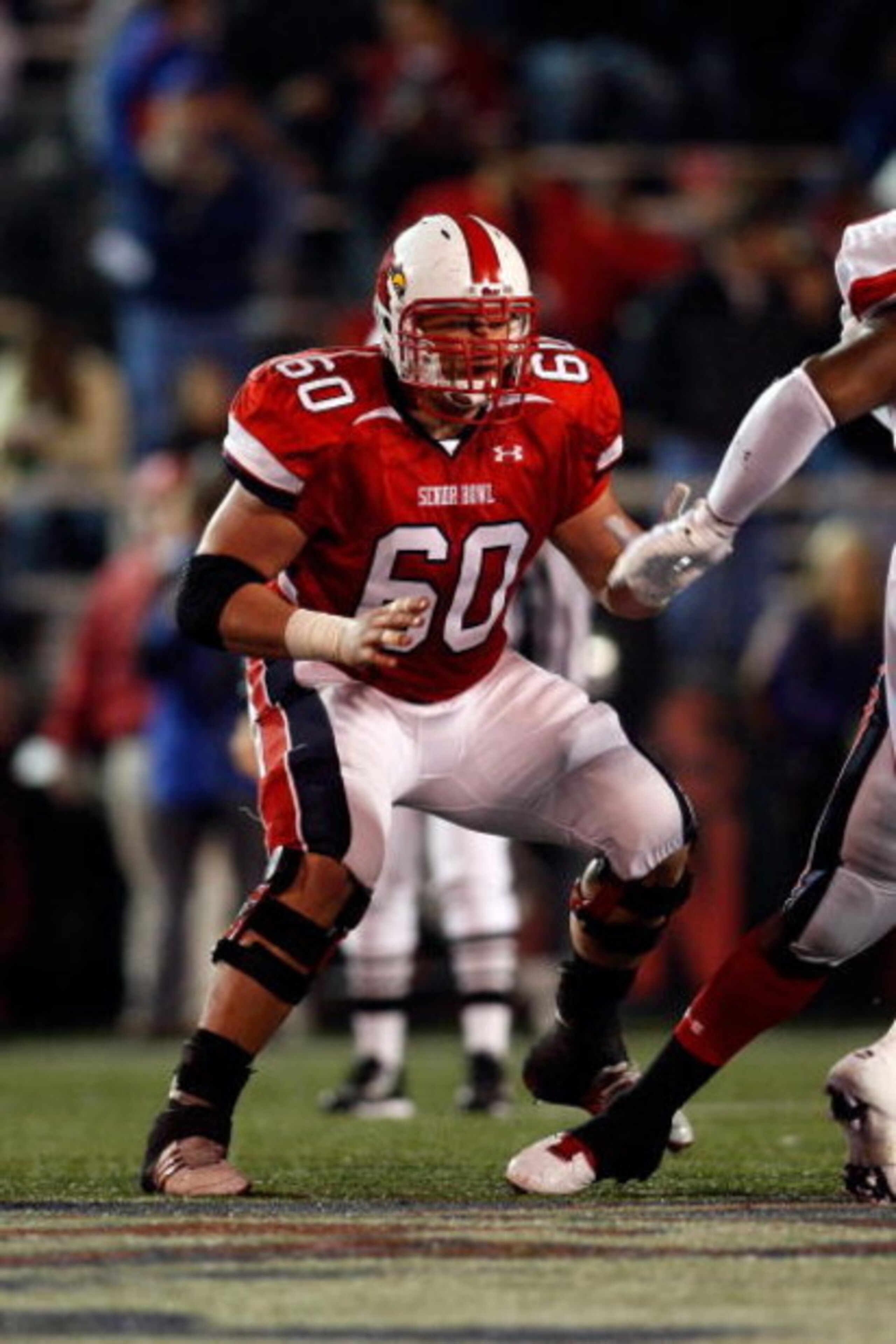 MOBILE, AL - JANUARY 24: Eric Wood #60 of the South Team looks to the sideline for a play against the North Team during the Under Armour Senior Bowl on January 24, 2009 at Ladd-Peebles Stadium in Mobile, Alabama. The South defeated the North 35-18. (Pho MOBILE, AL - JANUARY 24: Eric Wood #60 of the South Team looks to the sideline for a play against the North Team during the Under Armour Senior Bowl on January 24, 2009 at Ladd-Peebles Stadium in Mobile, Alabama. The South defeated the North 35-18. (Pho