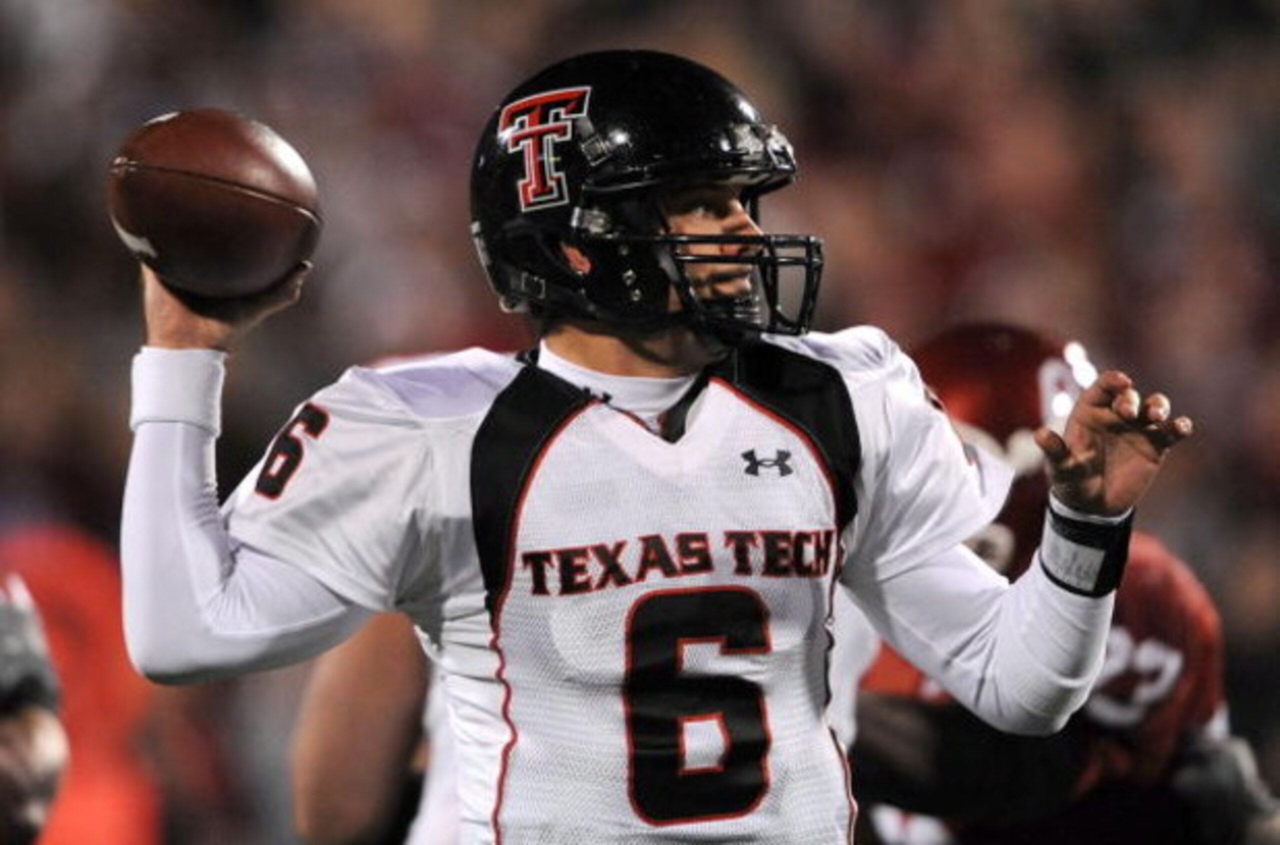 NORMAN, OK - NOVEMBER 22: Quarterback Graham Harrell #6 of the Texas Tech Red Raiders drops back to pass against the Oklahoma Sooners in the first quarter at Memorial Stadium on November 22, 2008 in Norman, Oklahoma. (Photo by Ronald Martinez/Getty Imag NORMAN, OK - NOVEMBER 22: Quarterback Graham Harrell #6 of the Texas Tech Red Raiders drops back to pass against the Oklahoma Sooners in the first quarter at Memorial Stadium on November 22, 2008 in Norman, Oklahoma. (Photo by Ronald Martinez/Getty Imag