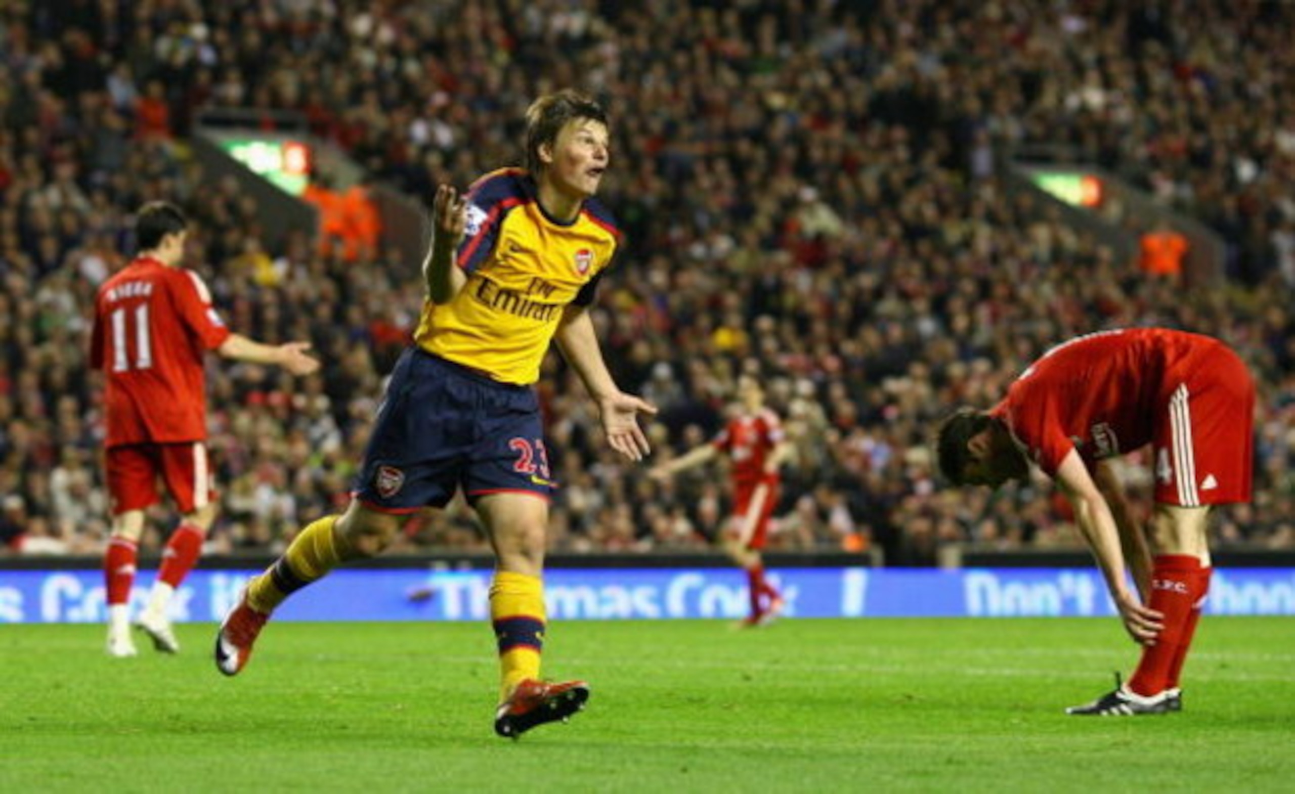 LIVERPOOL, UNITED KINGDOM - APRIL 21:  Andrey Arshavin of Arsenal  celebrates scoring his team's third goal and his hat trick during the Barclays Premier League match between Liverpool and Arsenal at Anfield on April 21, 2009 in Liverpool, England.  (Phot