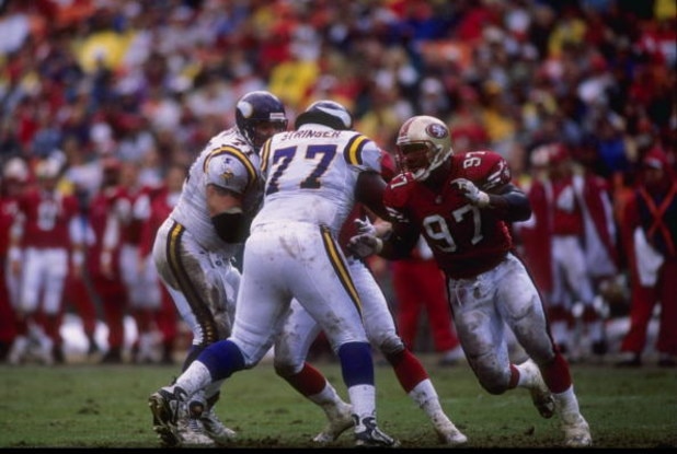 7 Dec 1997:  Bryant Young #97 of the San Francisco 49ers runs around Korey Stringer #77 of the Minnesota Vikings during a game at 3Com Park in San Francisco, California. The 49ers defeated the Vikings 28-17. Mandatory Credit: Otto Greule Jr.  /Allsport
