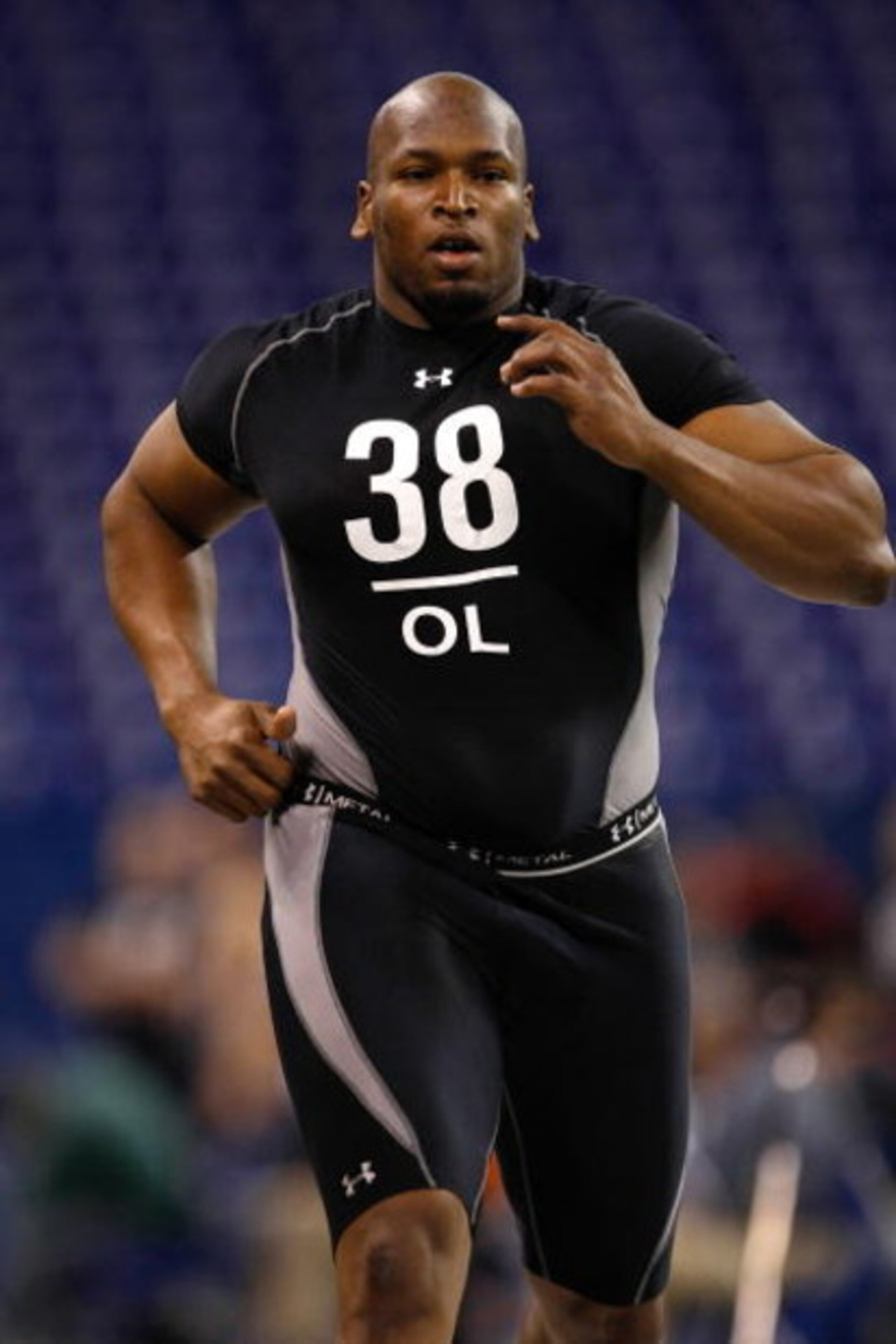 INDIANAPOLIS, IN - FEBRUARY 21: Offensive lineman Eugene Monroe of Virginia runs the 40 yard dash as he participates in drills during the NFL Scouting Combine presented by Under Armour at Lucas Oil Stadium on February 21, 2009 in Indianapolis, Indiana. ( INDIANAPOLIS, IN - FEBRUARY 21: Offensive lineman Eugene Monroe of Virginia runs the 40 yard dash as he participates in drills during the NFL Scouting Combine presented by Under Armour at Lucas Oil Stadium on February 21, 2009 in Indianapolis, Indiana. (