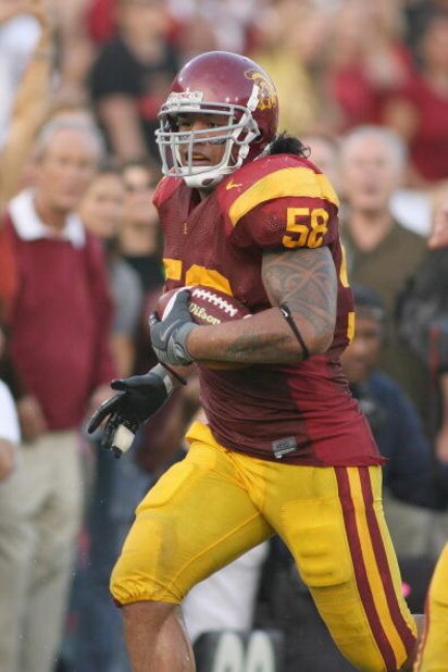 LOS ANGELES - SEPTEMBER 13:  Rey Maualuga #58 of the USC Trojans returns an interception 48 yards for a touchdown against the Ohio State Buckeyes in the second quarter on September 13, 2008 at the Los Angeles Memorial Coliseum in Los Angeles, California. 