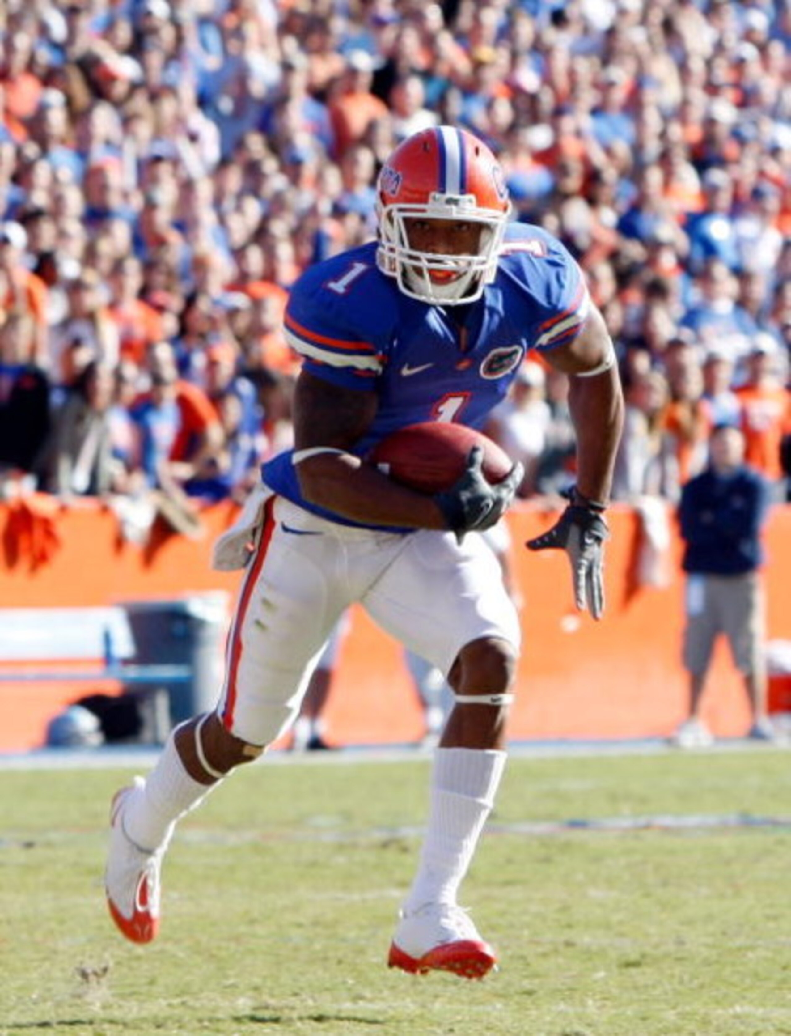GAINESVILLE, FL - NOVEMBER 22: Percy Harvin #1 of the Florida Gators runs for a touchdown during the game against the Citadel Bulldogs at Ben Hill Griffin Stadium on November 22, 2008 in Gainesville, Florida. (Photo by Sam Greenwood/Getty Images) GAINESVILLE, FL - NOVEMBER 22: Percy Harvin #1 of the Florida Gators runs for a touchdown during the game against the Citadel Bulldogs at Ben Hill Griffin Stadium on November 22, 2008 in Gainesville, Florida. (Photo by Sam Greenwood/Getty Images)