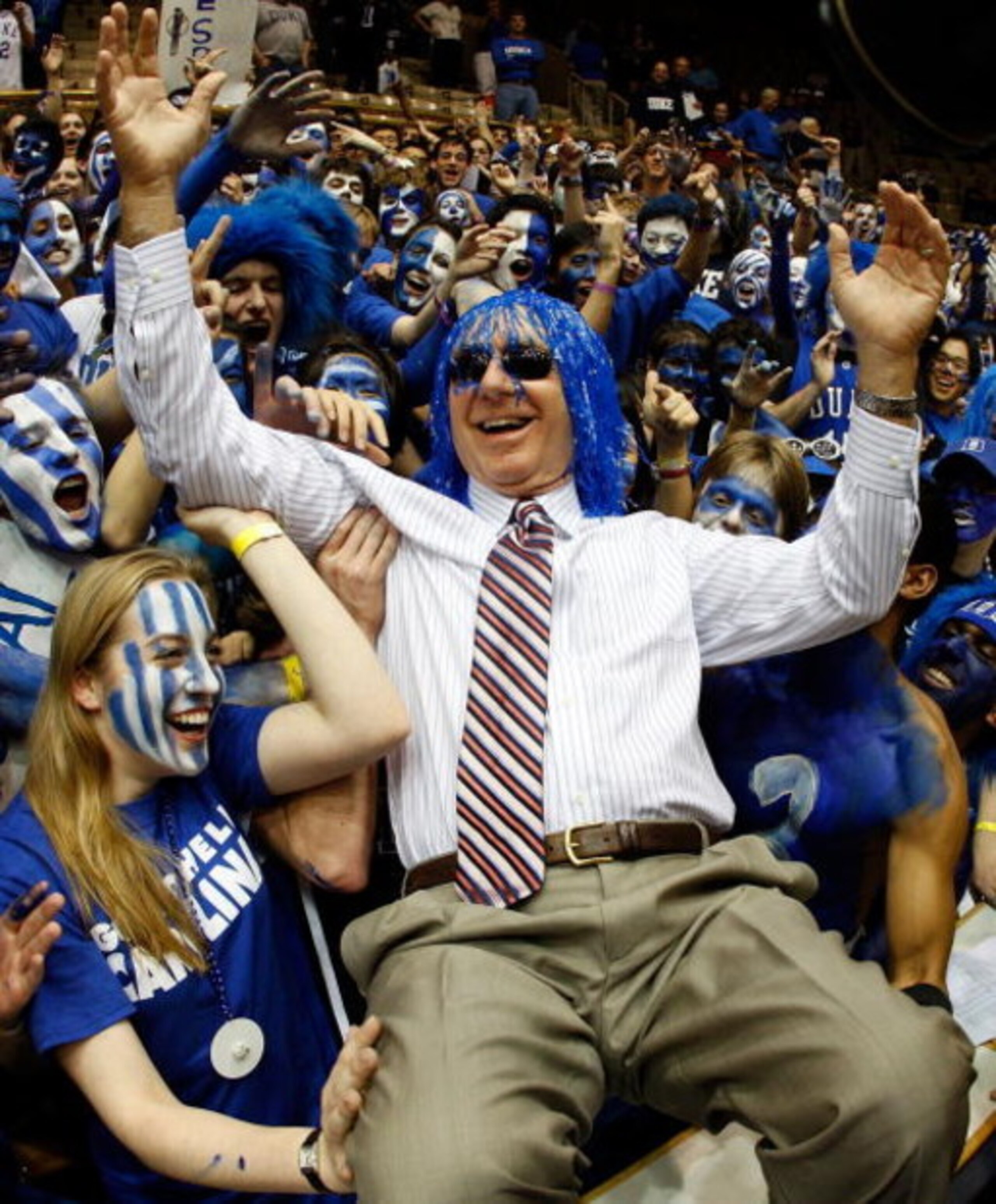 DURHAM, NC - FEBRUARY 11:  The Cameron Crazies of Duke clown around with Dick Vitale of ESPN before they face the North Carolina Tar Heels on February 11, 2009 at Cameron Indoor Stadium in Durham, North Carolina.  (Photo by Scott Halleran/Getty Images)