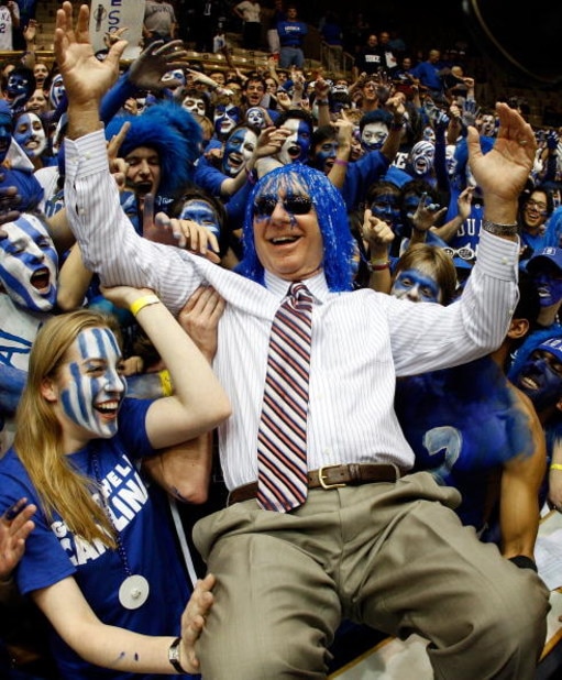 DURHAM, NC - FEBRUARY 11:  The Cameron Crazies of Duke clown around with Dick Vitale of ESPN before they face the North Carolina Tar Heels on February 11, 2009 at Cameron Indoor Stadium in Durham, North Carolina.  (Photo by Scott Halleran/Getty Images)