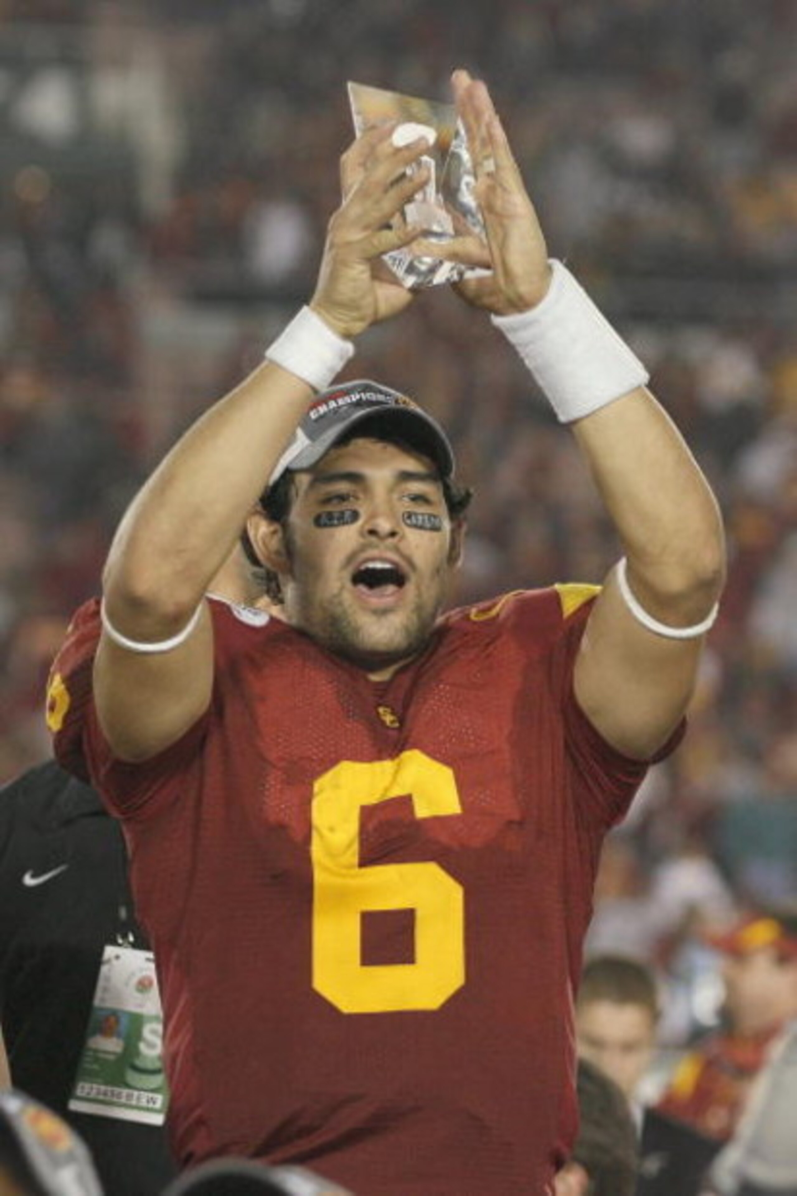 PASADENA, CA - JANUARY 1: Mark Sanchez #6 of the USC Trojans rejoices as he holds te Offensive Player of the Game Trophy after the game against the Penn State Nittany Lions on January 1, 2009 at the Rose Bowl in Pasadena, California. USC won 38-24. (Ph PASADENA, CA - JANUARY 1: Mark Sanchez #6 of the USC Trojans rejoices as he holds te Offensive Player of the Game Trophy after the game against the Penn State Nittany Lions on January 1, 2009 at the Rose Bowl in Pasadena, California. USC won 38-24. (Ph