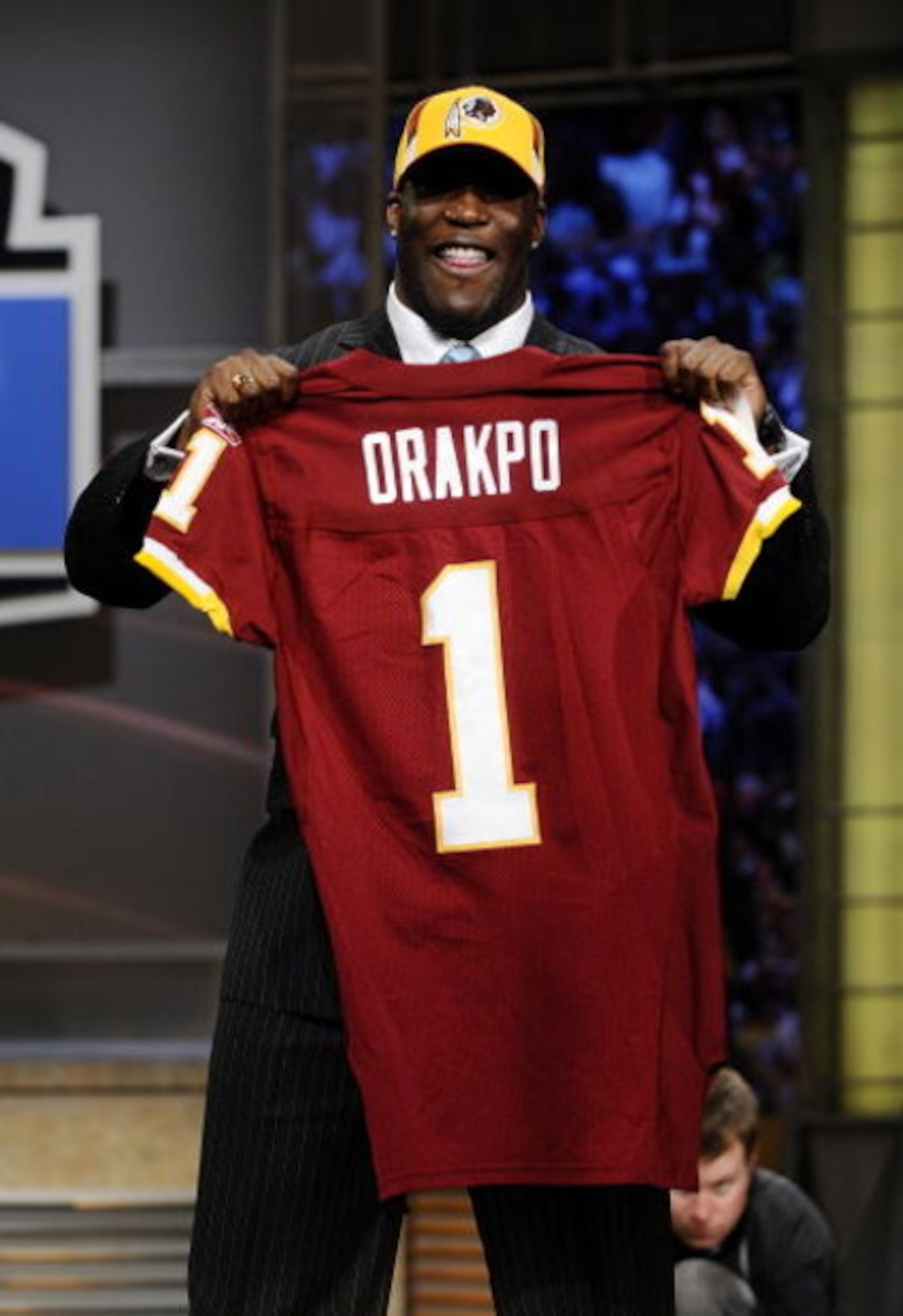 NEW YORK - APRIL 25: Washington Redskins #13 draft pick Brian Orakpo poses for photographers at Radio City Music Hall for the 2009 NFL Draft on April 25, 2009 in New York City (Photo by Jeff Zelevansky/Getty Images) NEW YORK - APRIL 25: Washington Redskins #13 draft pick Brian Orakpo poses for photographers at Radio City Music Hall for the 2009 NFL Draft on April 25, 2009 in New York City (Photo by Jeff Zelevansky/Getty Images)