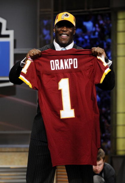 NEW YORK - APRIL 25:   Washington Redskins #13 draft pick Brian Orakpo poses for photographers at Radio City Music Hall for the 2009 NFL Draft on April 25, 2009 in New York City  (Photo by Jeff Zelevansky/Getty Images)