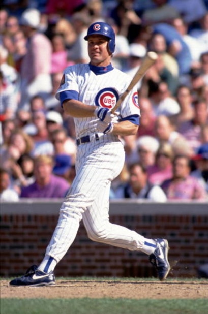 CHICAGO - MAY 20:  Second Baseman Ryne Sandberg of the Chicago Cubs makes contact with a pitch during a game against the San Francisco Giants at Wrigley Field on May 20, 1994 in Chicago, Illinois. (Photo by Jonathan Daniel/Getty Images)