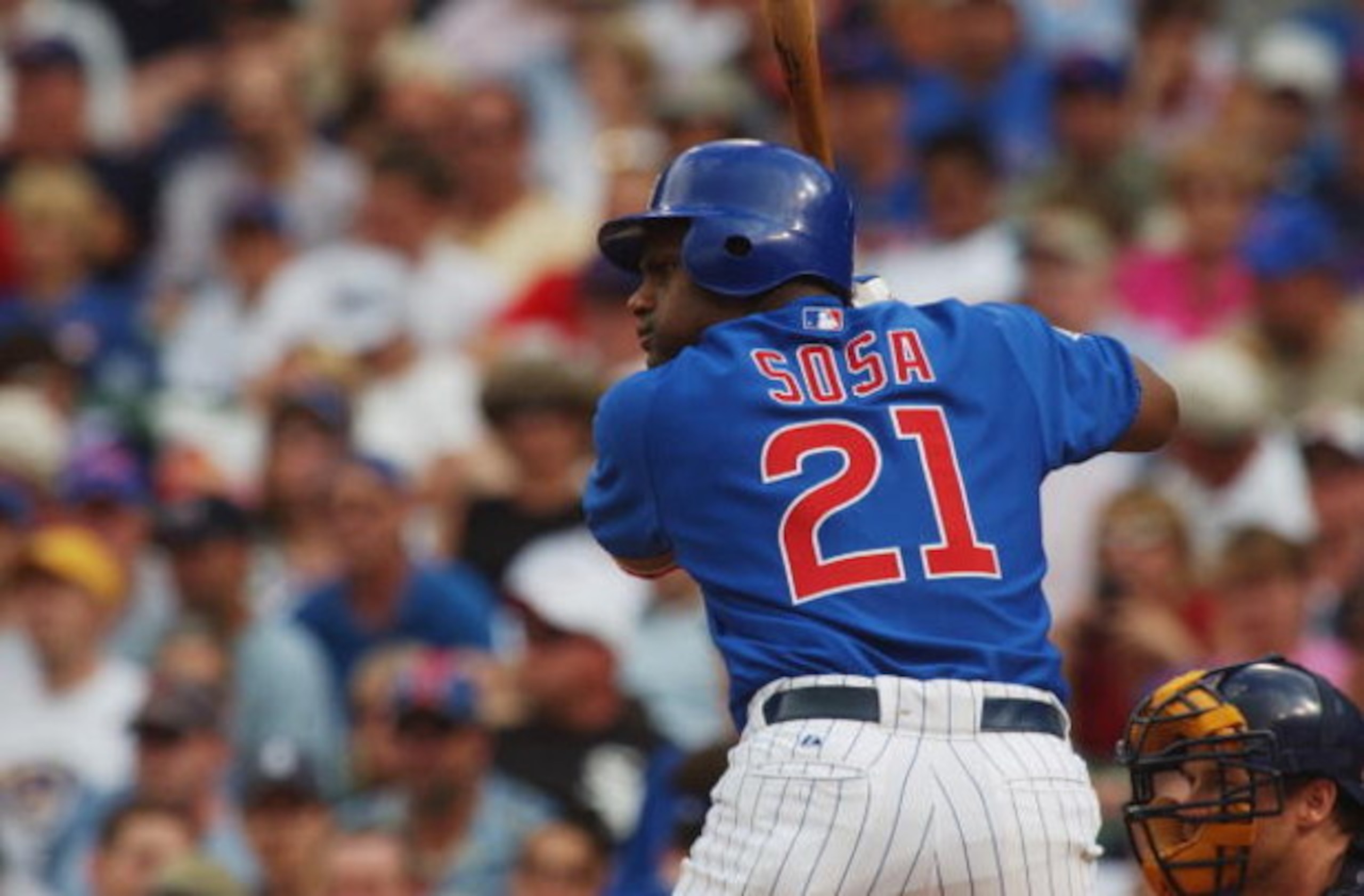 CHICAGO - JULY 16:  Sammy Sosa #21 of the Chicago Cubs bats during a game against the Milwaukee Brewers on July 16, 2004 at Wrigley Field in Chicago, Illinois.  The Brewers defeated the Cubs 3-2.  (Photo by Jonathan Daniel/Getty Images)