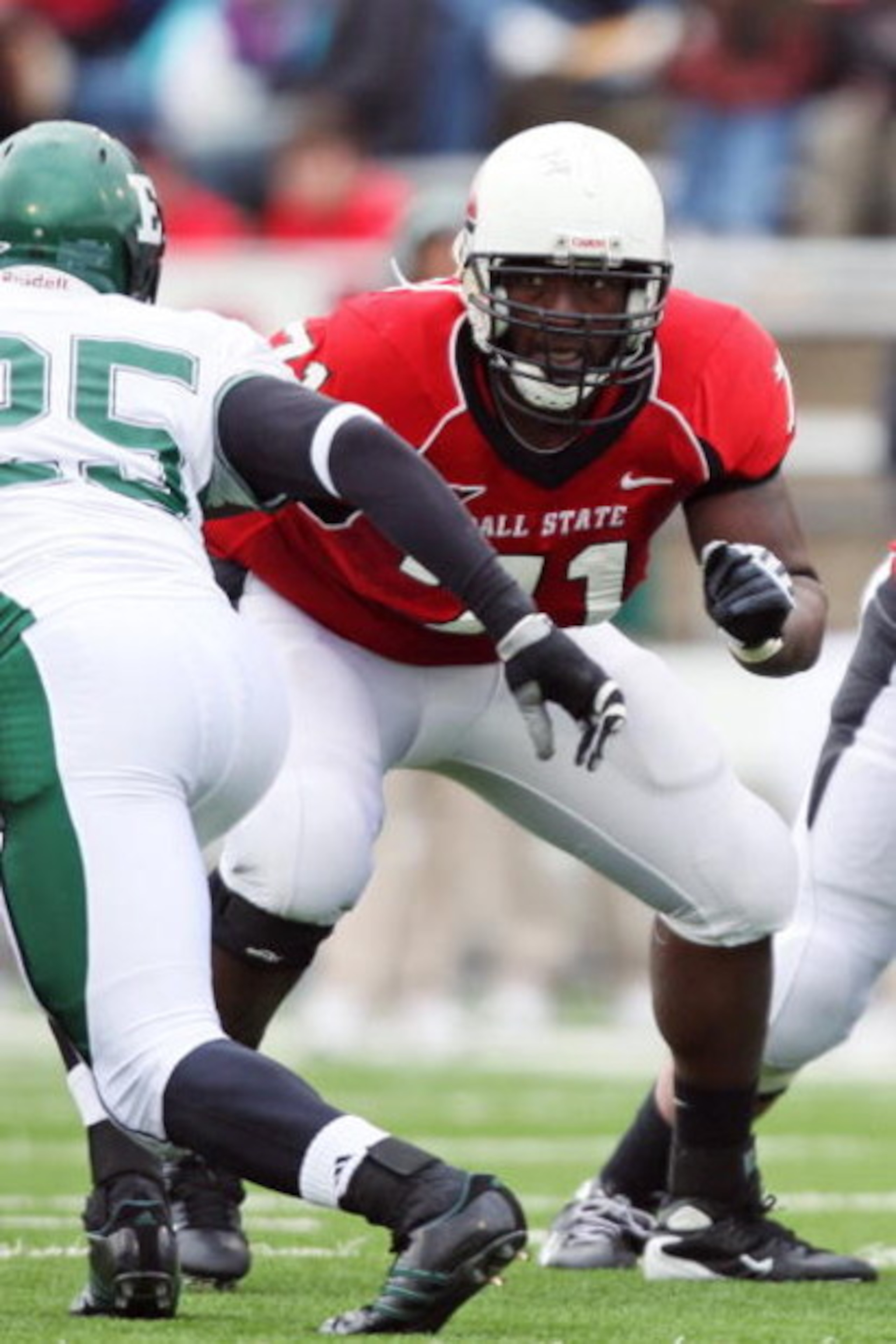 MUNCIE, IN - OCTOBER 25: Offensive lineman Robert Brewster #71 of the Ball State Cardinals blocks against the Eastern Michigan Eagles on October 25, 2008 at Scheumann Stadium in Muncie, Indiana.  (Photo by Jamie Sabau/Getty Images)