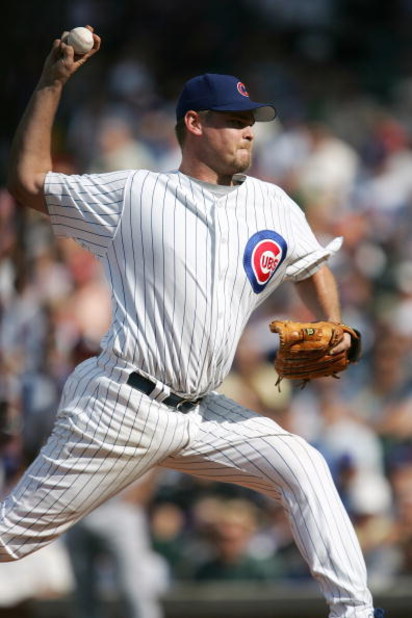 CHICAGO - AUGUST 24:  Kerry Wood #34 of the Chicago Cubs bats during the game with the Atlanta Braves on August 24, 2005 at Wrigley Field in Chicago, Illinois. The Braves defeated the Cubs 3-1. (Photo by Jonathan Daniel/Getty Images)