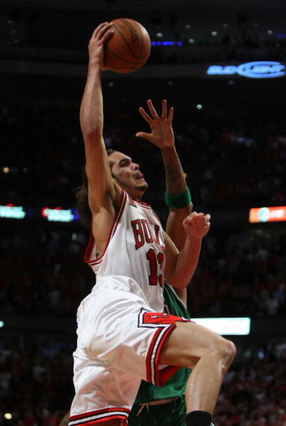 CHICAGO - APRIL 30: Joakim Noah #13 of the Chicago Bulls goes up for a shot against the Boston Celtics in Game Six of the Eastern Conference Quarterfinals during the 2009 NBA Playoffs at the United Center on April 30, 2009 in Chicago, Illinois. The Bulls 