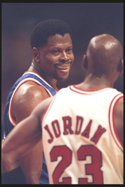 6 Dec 1995:  Center Patrick Ewing of the New York Knicks smiles at guard Michael Jordan of the Chicago Bulls at the United Center in Chicago, Illinois.  The Bulls won the game 101-94. NOTE TO USER:  It is expressly understood that the only rights Allsport