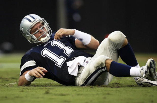JACKSONVILLE, FL - SEPTEMBER 10:  Quarterback Drew Bledsoe #11 of the Dallas Cowboys gets up after being knocked down against the Jacksonville Jaguars at Alltel Stadium on September 10, 2006 in Jacksonville, Florida. The Jaguars defeated the Cowboys 24-17