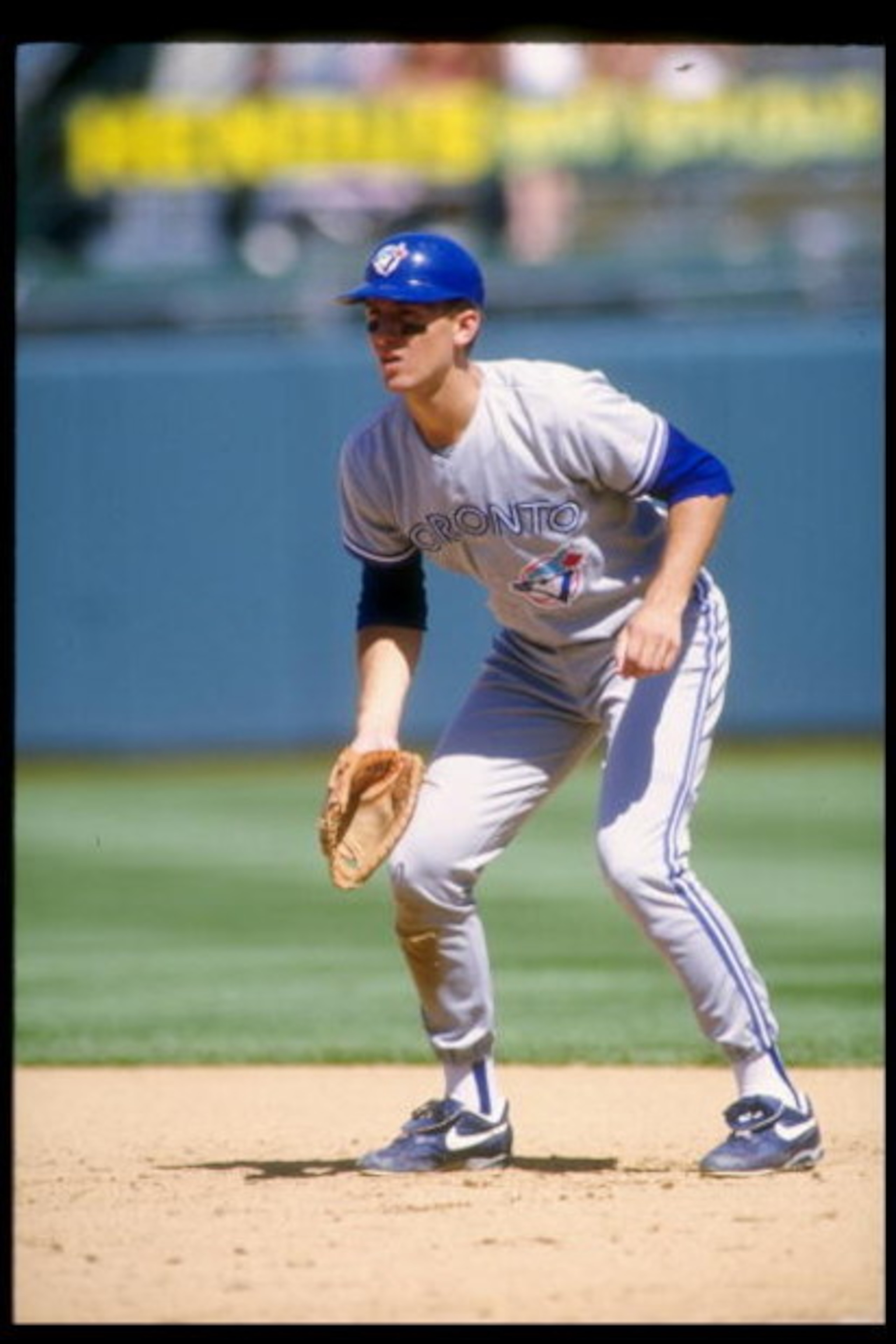 1 Sep 1993:  Infielder John Olerud of the Toronto Blue Jays stands in position during a game against the Oakland Athletics at the Oakland Coliseum in Oakland, California.  Mandatory Credit: Otto Greule  /Allsport