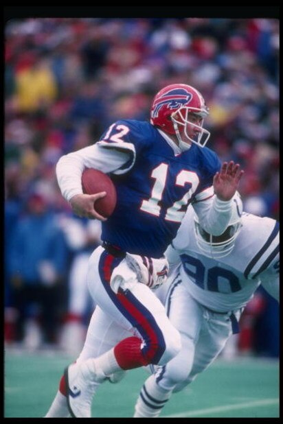12 Nov 1989:  Quarterback Jim Kelly of the Buffalo Bills runs with the ball during a game against the Indianapolis Colts at Rich Stadium in Orchard Park, New York.  The Bills won the game, 30-7. Mandatory Credit: Rick Stewart  /Allsport