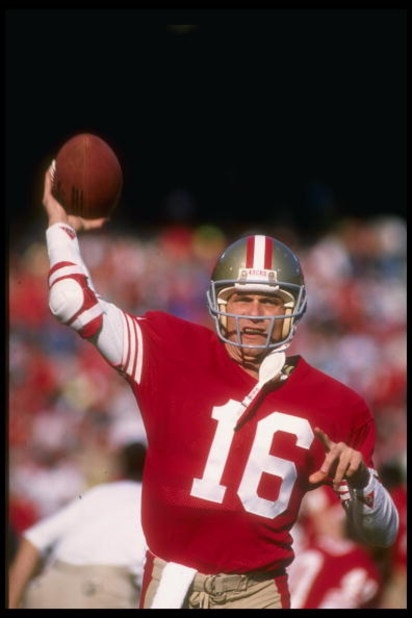6 Jan 1990:  Quarterback Joe Montana of the San Francisco 49ers looks to pass the ball during a playoff game against the Minnesota Vikings at Candlestick Park in San Francisco, California.  The 49ers won the game, 41-13. Mandatory Credit: Otto Greule  /Al