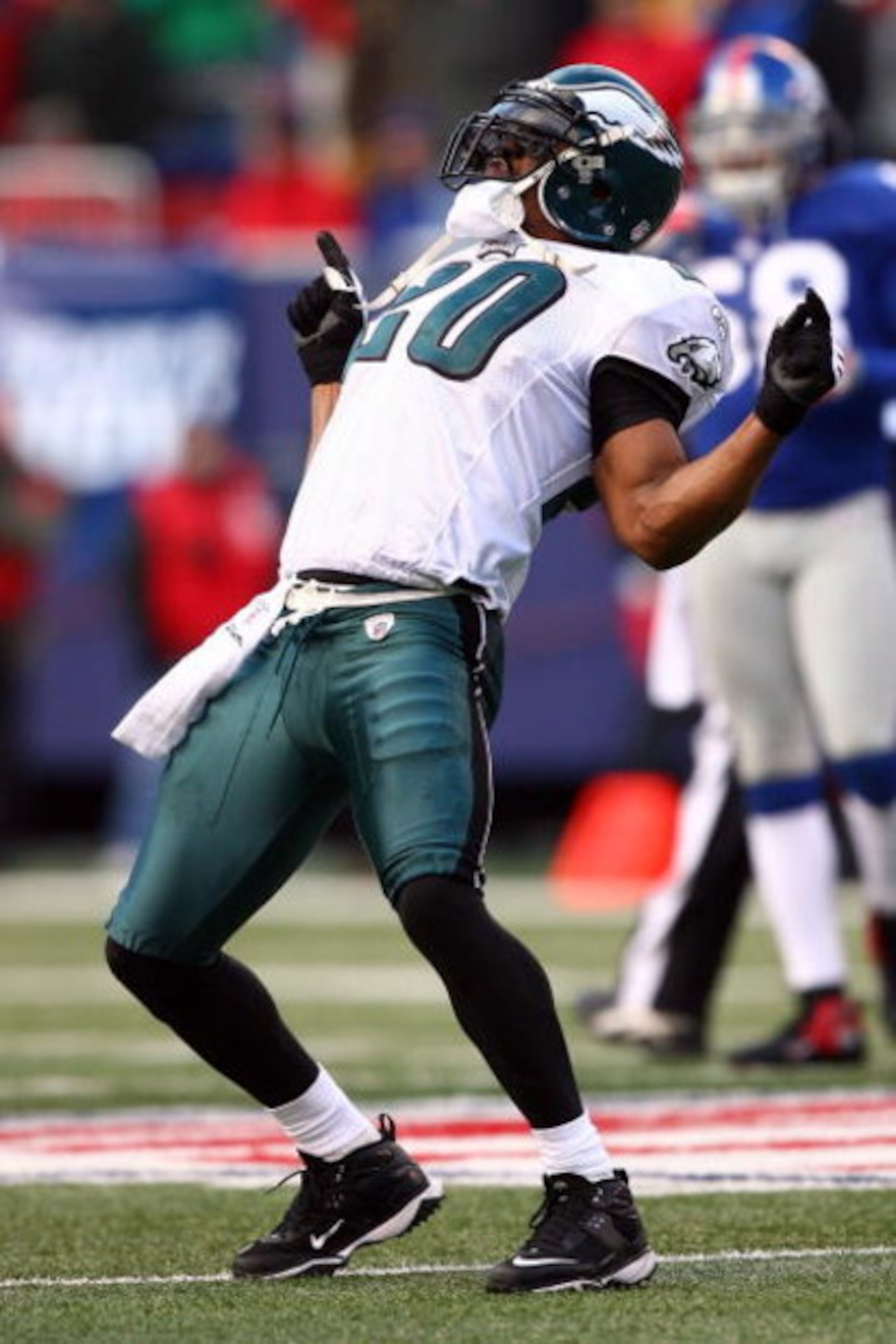 EAST RUTHERFORD, NJ - JANUARY 11:  Brian Dawkins #20 of the Philadelphia Eagles reacts after a play against the New York Giants during the NFC Divisional Playoff Game on January 11, 2009 at Giants Stadium in East Rutherford, New Jersey.  (Photo by Al Bell