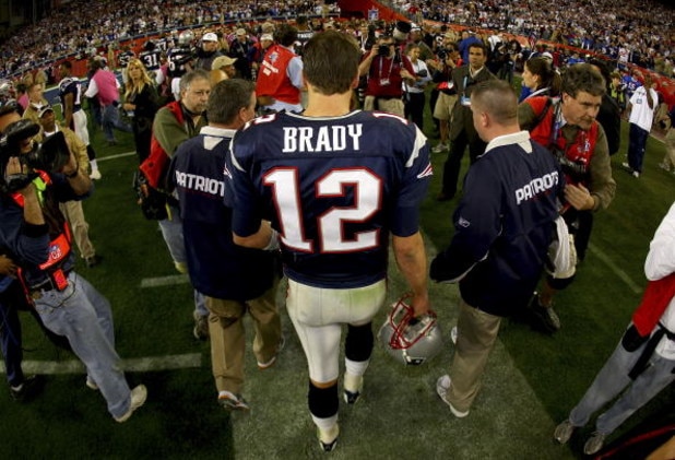 GLENDALE, AZ - FEBRUARY 03:  Quarterback Tom Brady #12 of the New England Patriots walks off the field after losing to the New York Giants 17-14 during Super Bowl XLII on February 3, 2008 at the University of Phoenix Stadium in Glendale, Arizona.  (Photo 