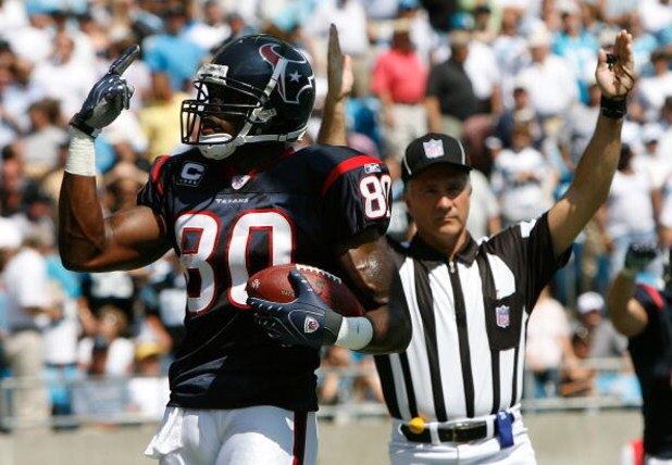 CHARLOTTE, NC - SEPTEMBER 16:  Receiver Andre Johnson #80 of the Houston Texans signals to the crowd that he has two touchdowns in the first half of their 34-21 win over the Carolina Panthers at Bank of America Stadium on September 16, 2007 in Charlotte, 