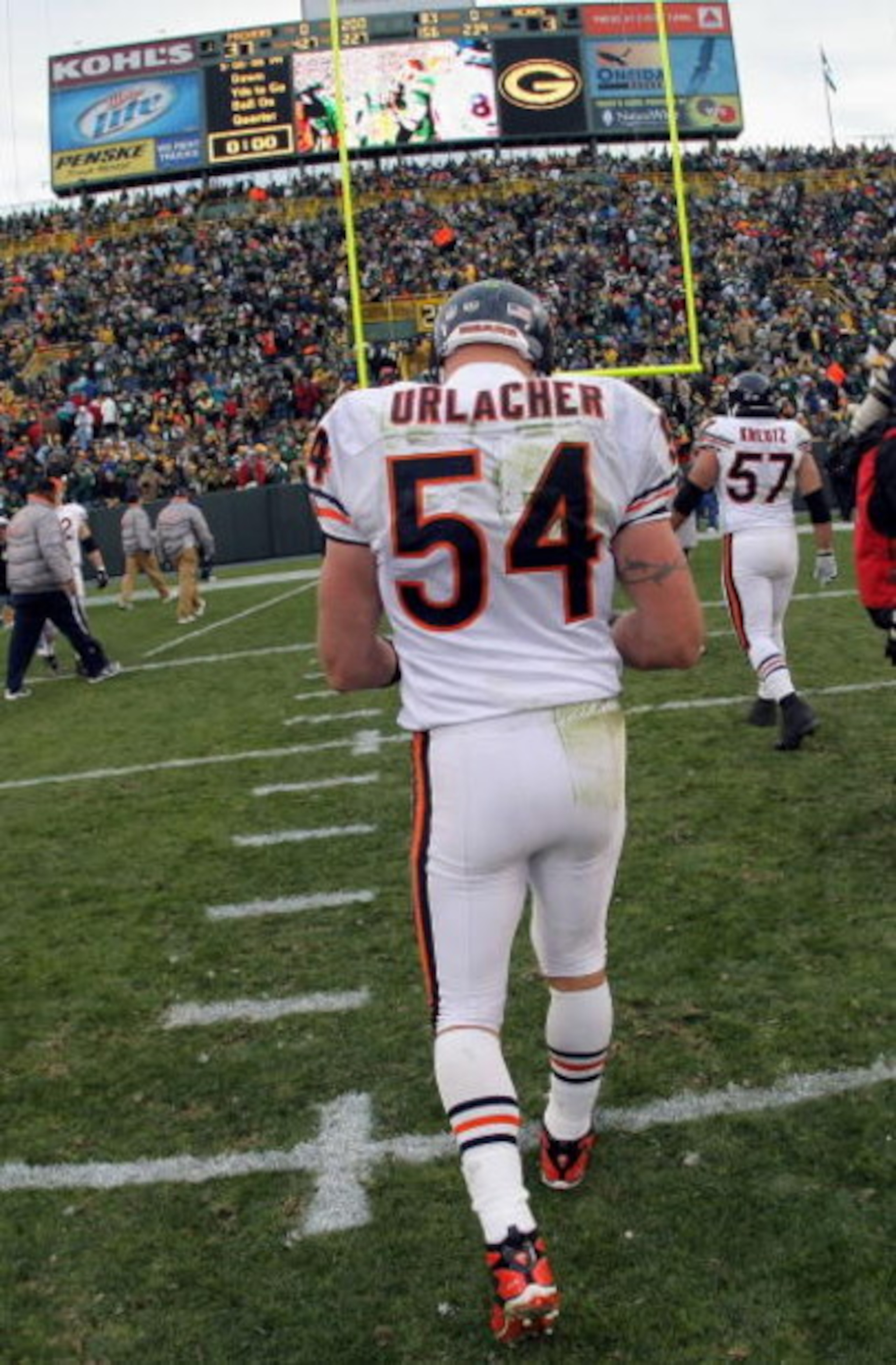 GREEN BAY, WI - NOVEMBER 16:  Linebacker Brian Urlacher #54 of the Chicago Bears leaves the field after facing the Green Bay Packers during NFL action at Lambeau Field on November 16, 2008 in Green Bay, Wisconsin. The Packers defeated the Bears 37-3.  (Ph
