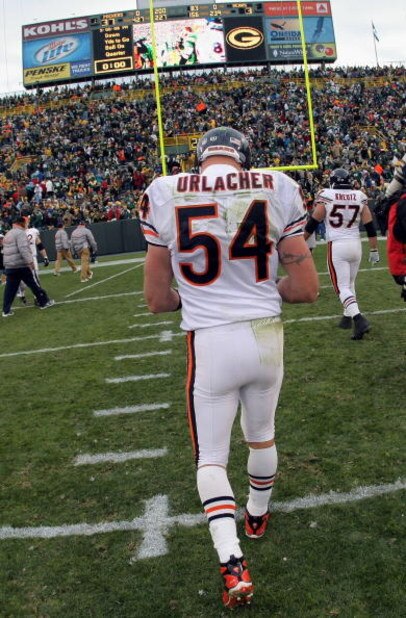 GREEN BAY, WI - NOVEMBER 16:  Linebacker Brian Urlacher #54 of the Chicago Bears leaves the field after facing the Green Bay Packers during NFL action at Lambeau Field on November 16, 2008 in Green Bay, Wisconsin. The Packers defeated the Bears 37-3.  (Ph