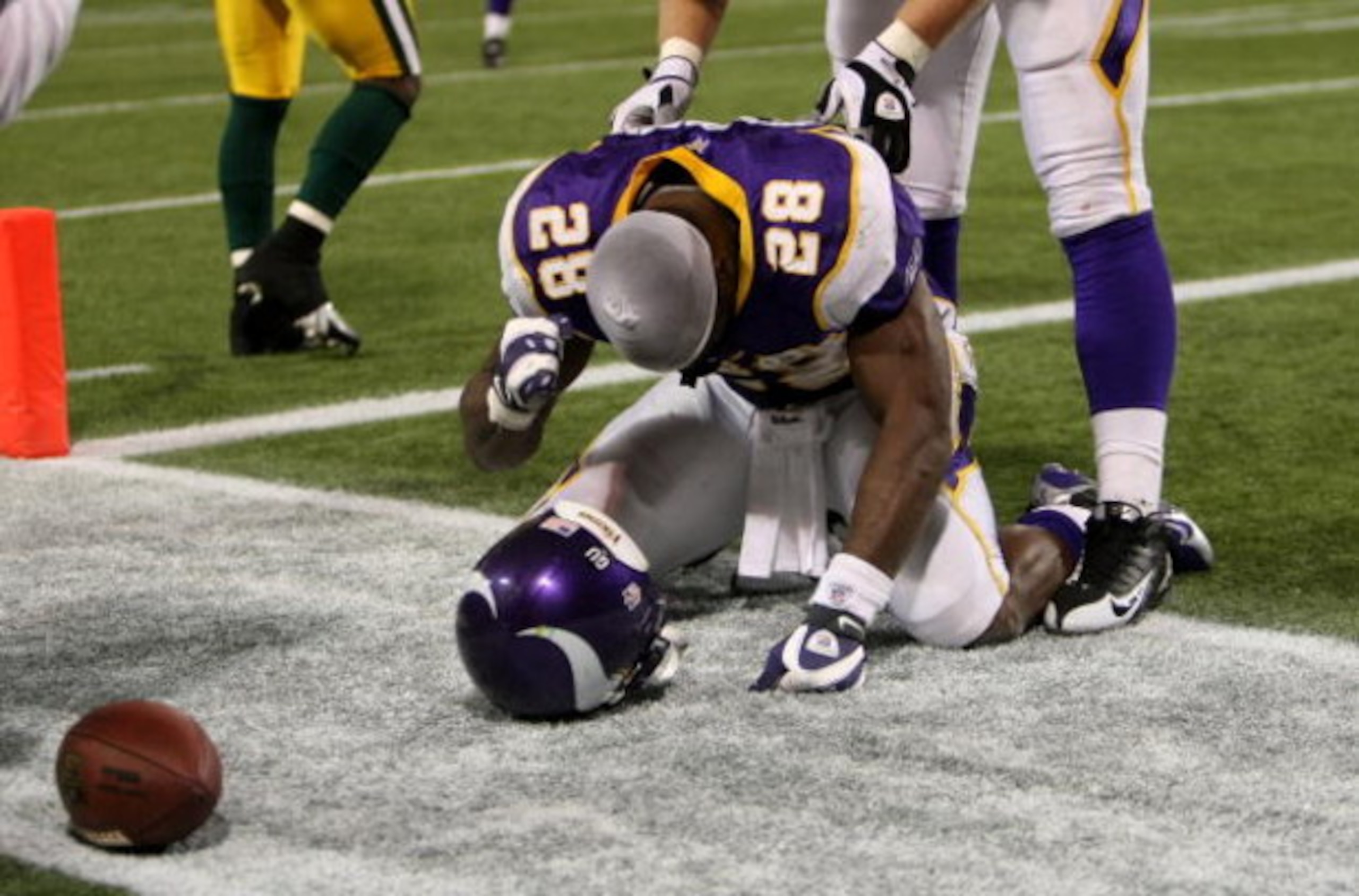 MINNEAPOLIS - NOVEMBER 09:  Running back Adrian Peterson #28 of the Minnesota Vikings celebrates his game winning 29 yard touchdown run with 2:22 left in the game with the Green Bay Packers on November 9, 2008 at the Metrodome in Mineapolis, Minnesota.  (