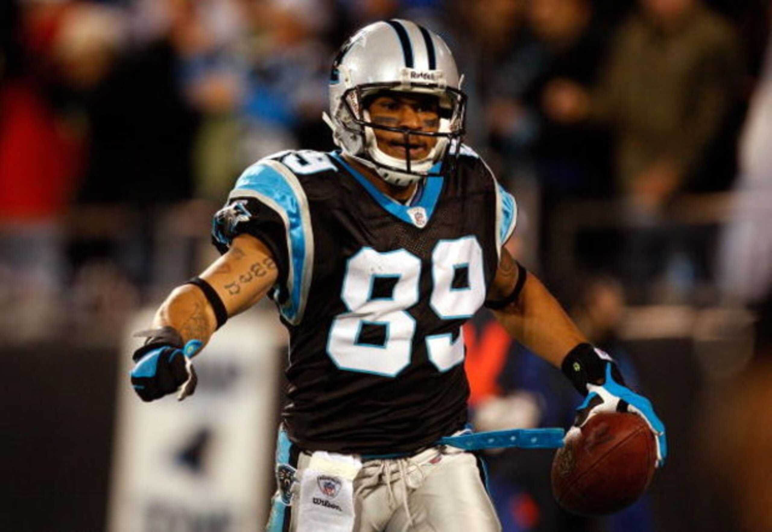 CHARLOTTE, NC - DECEMBER 08:  Steve Smith #89 of the Carolina Panthers celebrates after scoring a touchdown against the Tampa Bay Buccaneers during their game at Bank of America Stadium on December 8, 2008 in Charlotte, North Carolina.  (Photo by Streeter