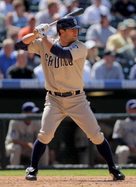 DENVER - APRIL 29:  Chris Burke #8 of the San Diego Padres pinch hits against the Colorado Rockies during MLB action at Coors Field on April 29, 2009 in Denver, Colorado. The Rockies defeated the Padres 7-5.  (Photo by Doug Pensinger/Getty Images)
