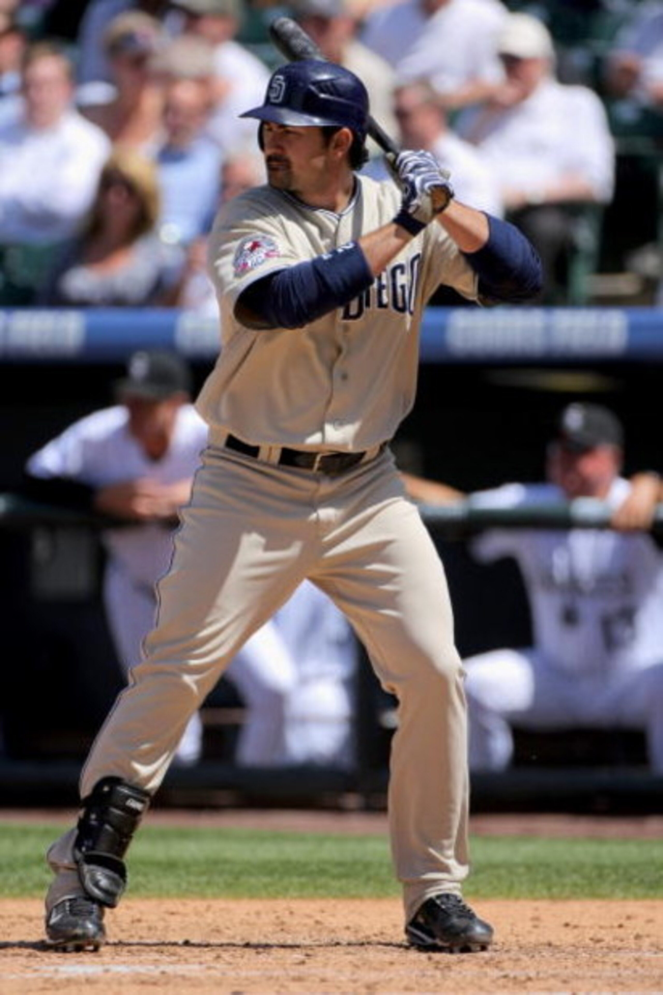 DENVER - APRIL 29: First baseman Adrian Gonzalez #23 of the San Diego Padres takes an at bat against the Colorado Rockies during MLB action at Coors Field on April 29, 2009 in Denver, Colorado. The Rockies defeated the Padres 7-5. (Photo by Doug Pensing DENVER - APRIL 29: First baseman Adrian Gonzalez #23 of the San Diego Padres takes an at bat against the Colorado Rockies during MLB action at Coors Field on April 29, 2009 in Denver, Colorado. The Rockies defeated the Padres 7-5. (Photo by Doug Pensing