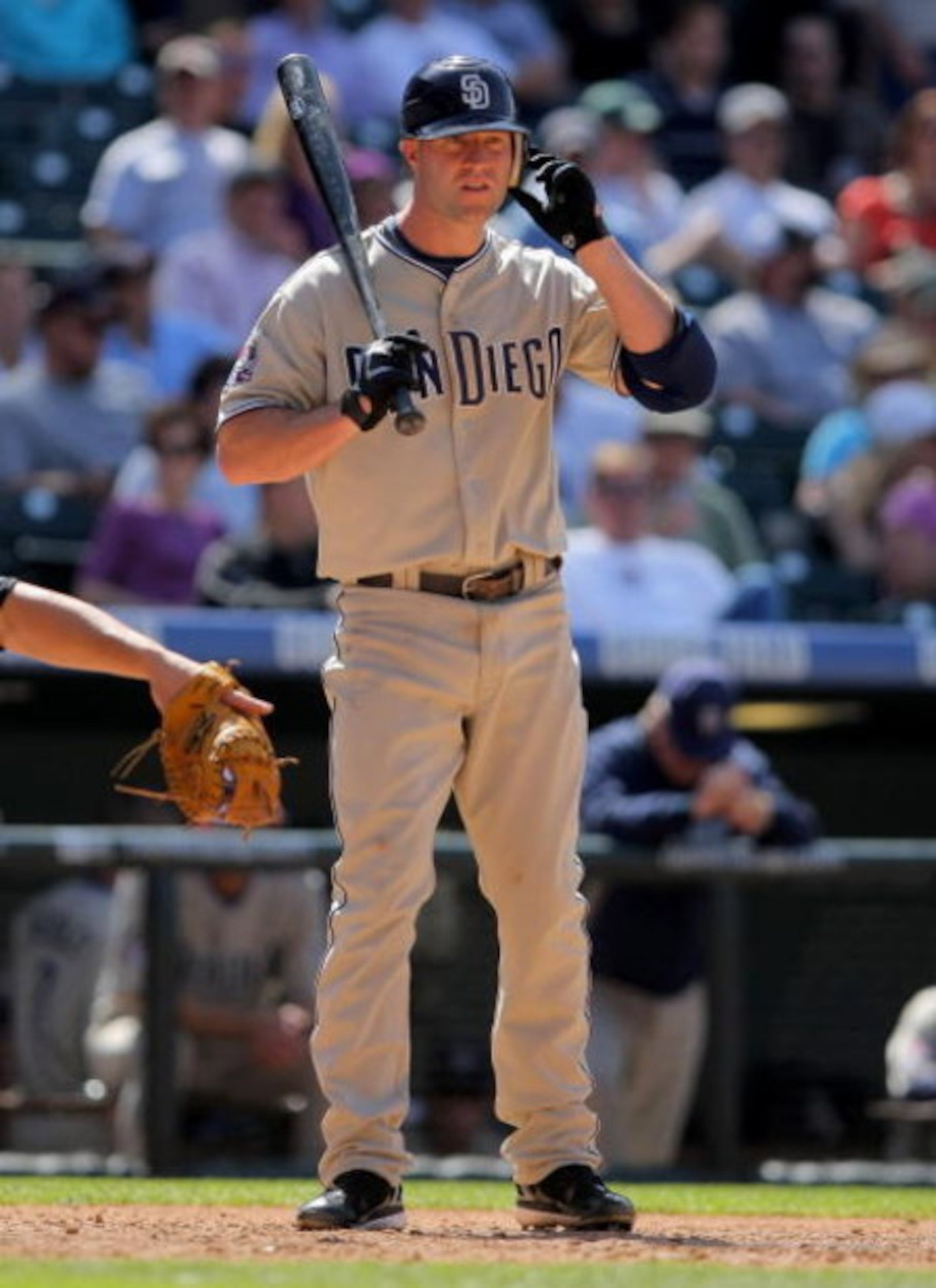 DENVER - APRIL 29: Third baseman Kevin Kouzmanoff #5 of the San Diego Padres takes an at bat against the Colorado Rockies during MLB action at Coors Field on April 29, 2009 in Denver, Colorado. The Rockies defeated the Padres 7-5. (Photo by Doug Pensing DENVER - APRIL 29: Third baseman Kevin Kouzmanoff #5 of the San Diego Padres takes an at bat against the Colorado Rockies during MLB action at Coors Field on April 29, 2009 in Denver, Colorado. The Rockies defeated the Padres 7-5. (Photo by Doug Pensing